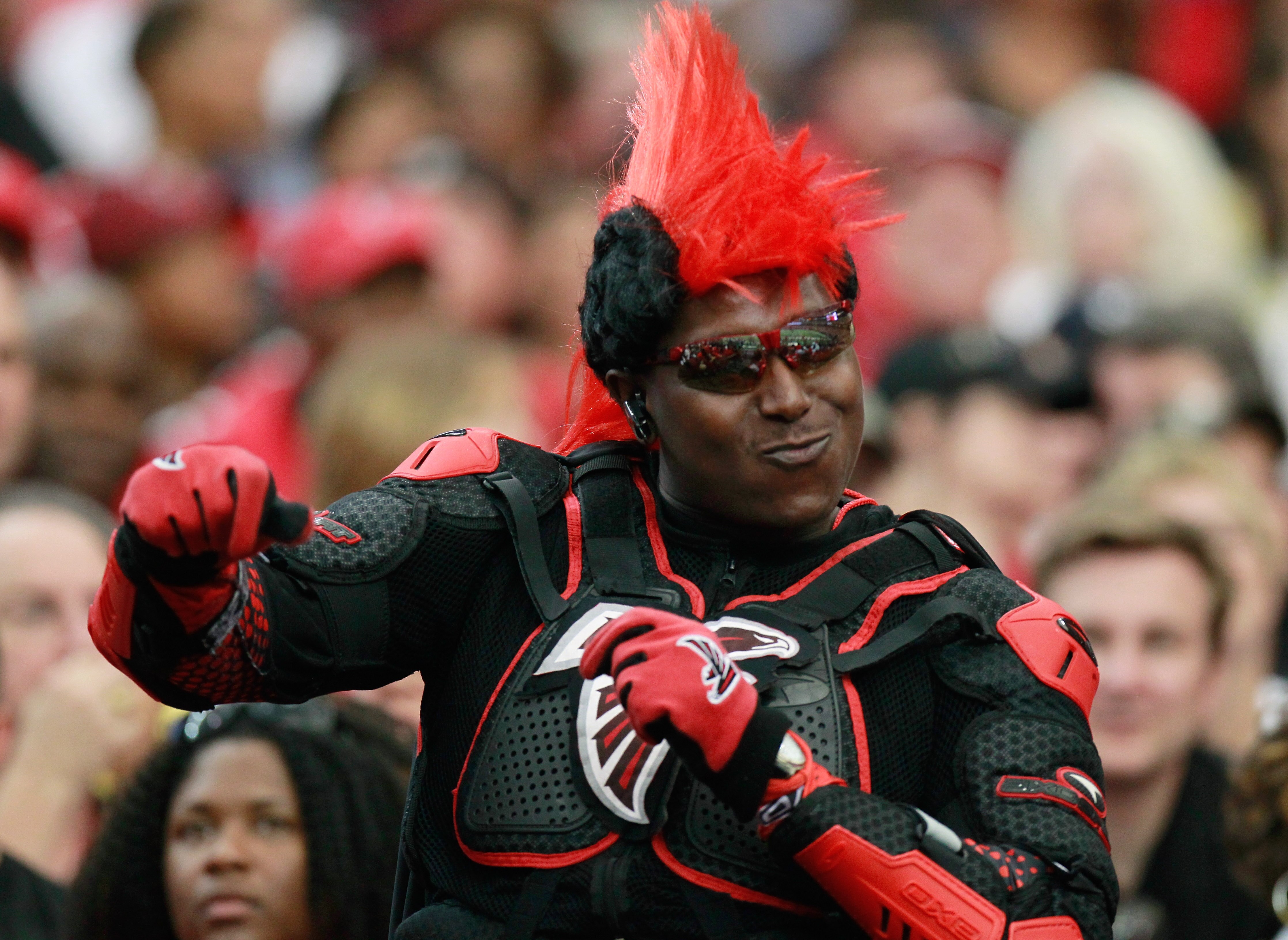 ATLANTA - SEPTEMBER 19:  A fan of the Atlanta Falcons cheers during the game against the Arizona Cardinals at Georgia Dome on September 19, 2010 in Atlanta, Georgia.  (Photo by Kevin C. Cox/Getty Images)