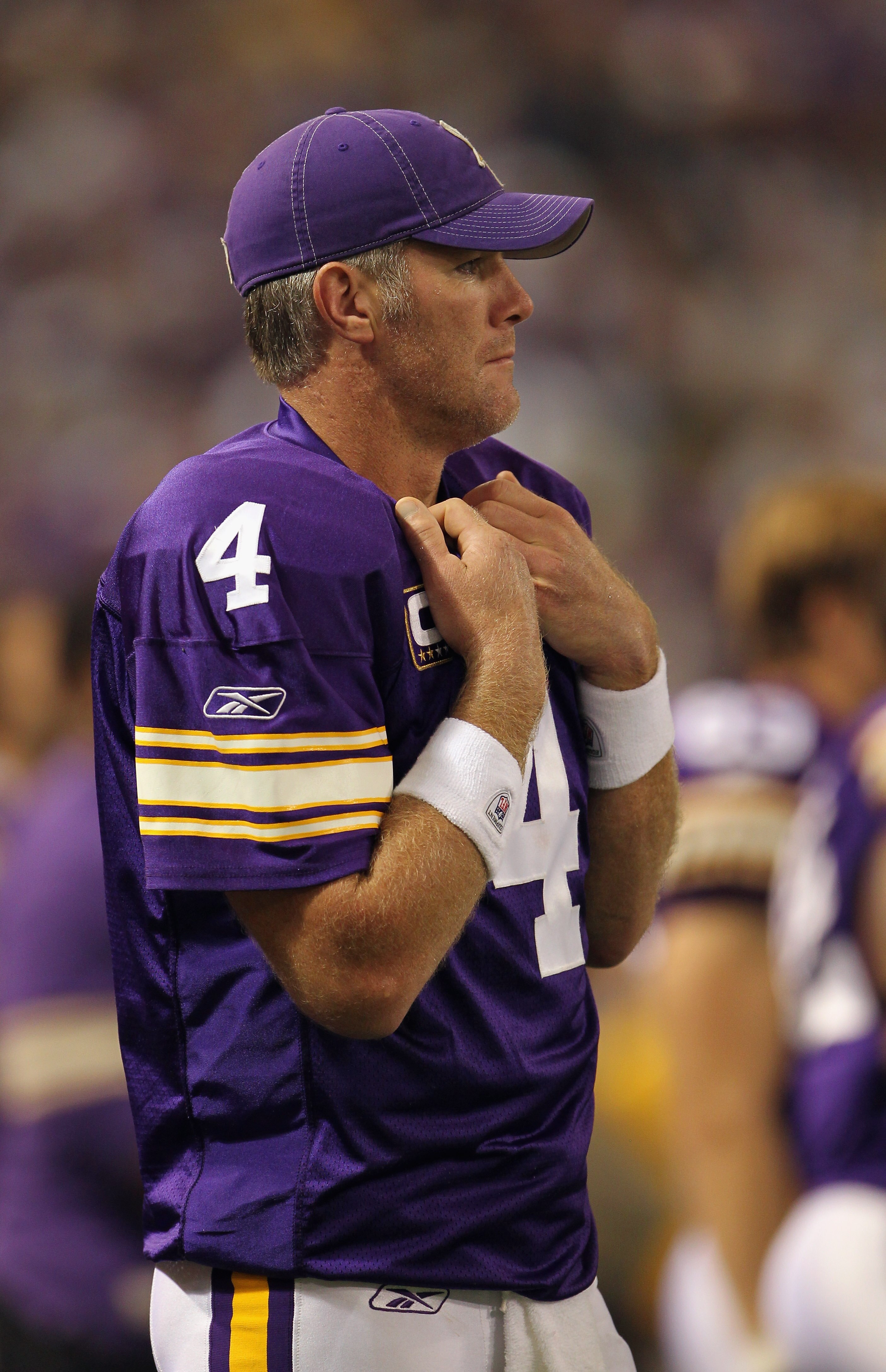 MINNEAPOLIS - SEPTEMBER 19:  Quarterback Brett Favre #4 of the Minnesota Vikings watches from the sidelines during the first half of the game against the Miami Dolphins on September 19, 2010 at Hubert H. Humphrey Metrodome in Minneapolis, Minnesota.  (Pho