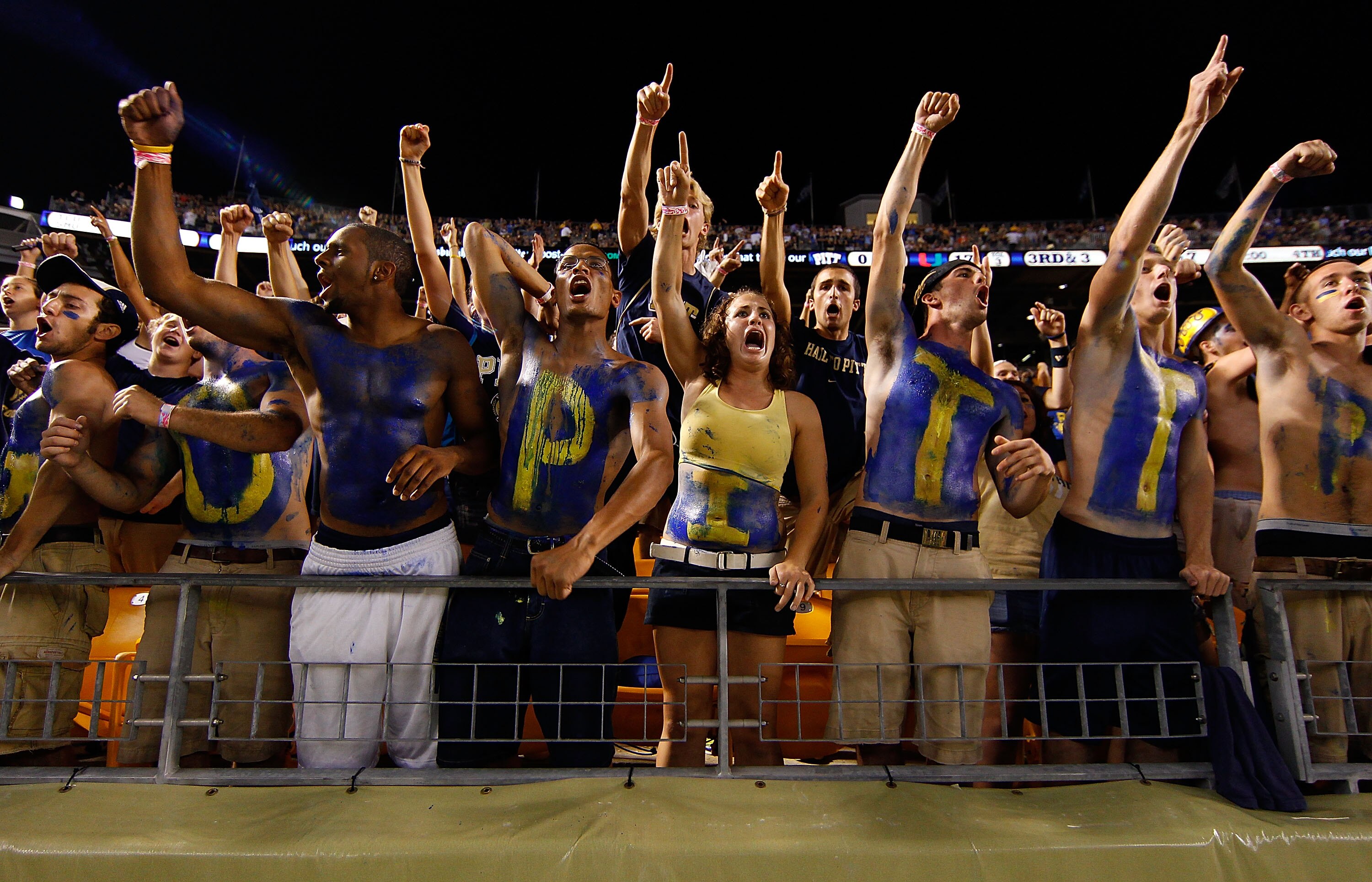 PITTSBURGH - SEPTEMBER 23:  University of Pittsburgh fans cheer during the game against the Miami Hurricanes on September 23, 2010 at Heinz Field in Pittsburgh, Pennsylvania.  (Photo by Jared Wickerham/Getty Images)