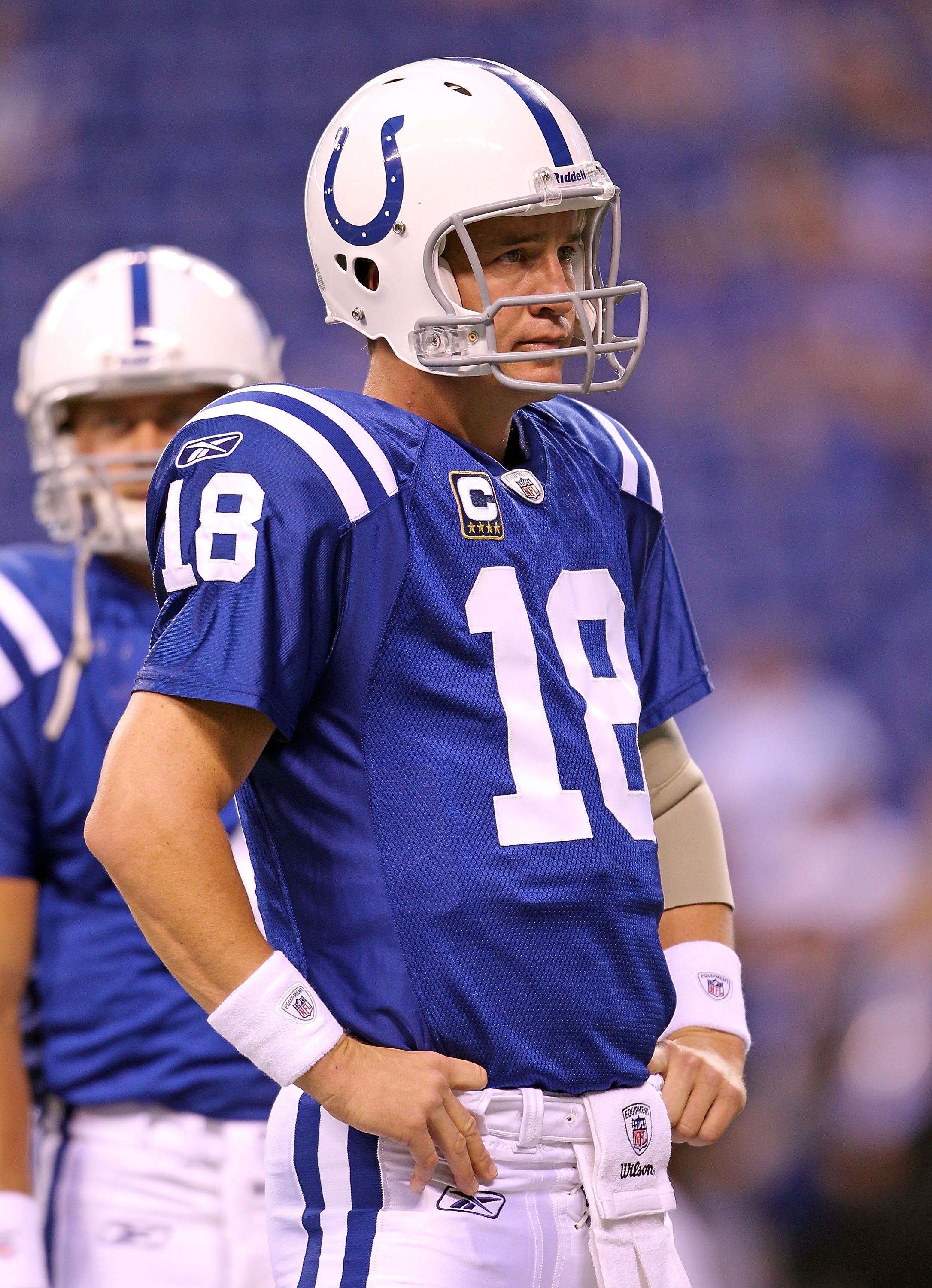 INDIANAPOLIS - SEPTEMBER 19:  Peyton Manning #18 of the Indianapolis Colts waits to throw the ball during  warmups before the NFL game against the New York Giants  at Lucas Oil Stadium on September 19, 2010 in Indianapolis, Indiana.  (Photo by Andy Lyons/
