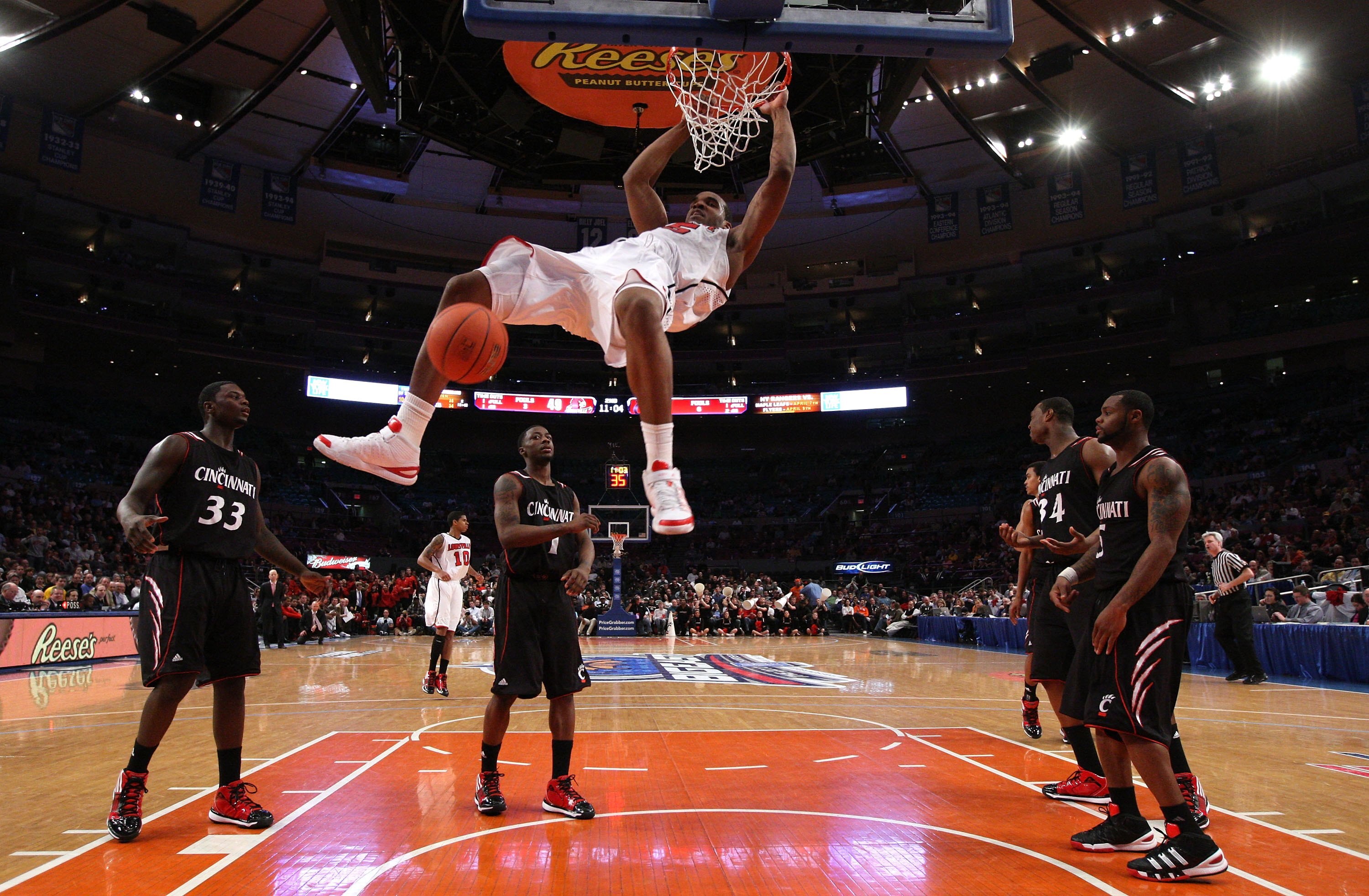 NEW YORK - MARCH 10:  Samardo Samuels #15 of the Louisville Cardinals dunks the ball against the Cincinnati Bearcats during the second round of 2010 NCAA Big East Tournament at Madison Square Garden on March 10, 2010 in New York City.  (Photo by Jim McIsa