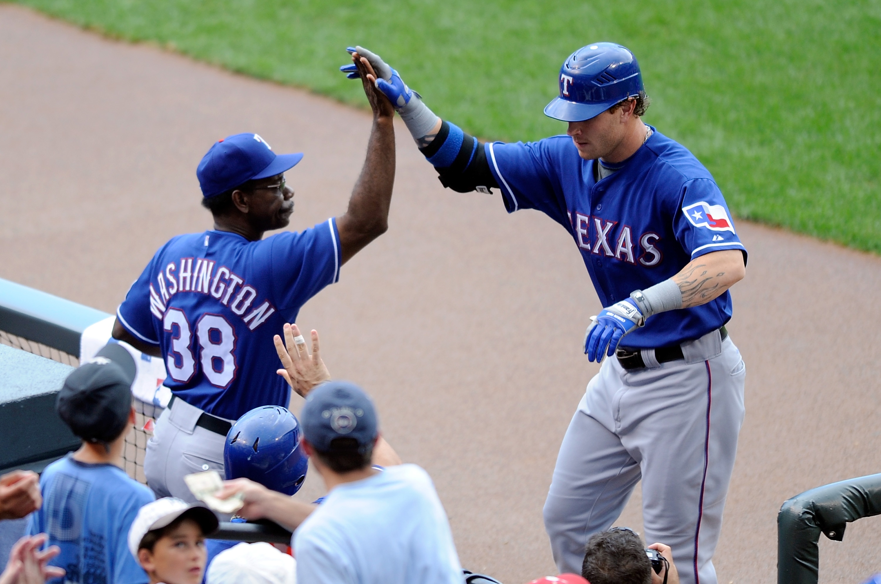 BALTIMORE - AUGUST 22: Josh Hamilton #32 of the Texas Rangers is congratulated by manager Ron Washington after hitting a home run in the first inning against the Baltimore Orioles at Camden Yards on August 22, 2010 in Baltimore, Maryland. (Photo by Greg BALTIMORE - AUGUST 22: Josh Hamilton #32 of the Texas Rangers is congratulated by manager Ron Washington after hitting a home run in the first inning against the Baltimore Orioles at Camden Yards on August 22, 2010 in Baltimore, Maryland. (Photo by Greg