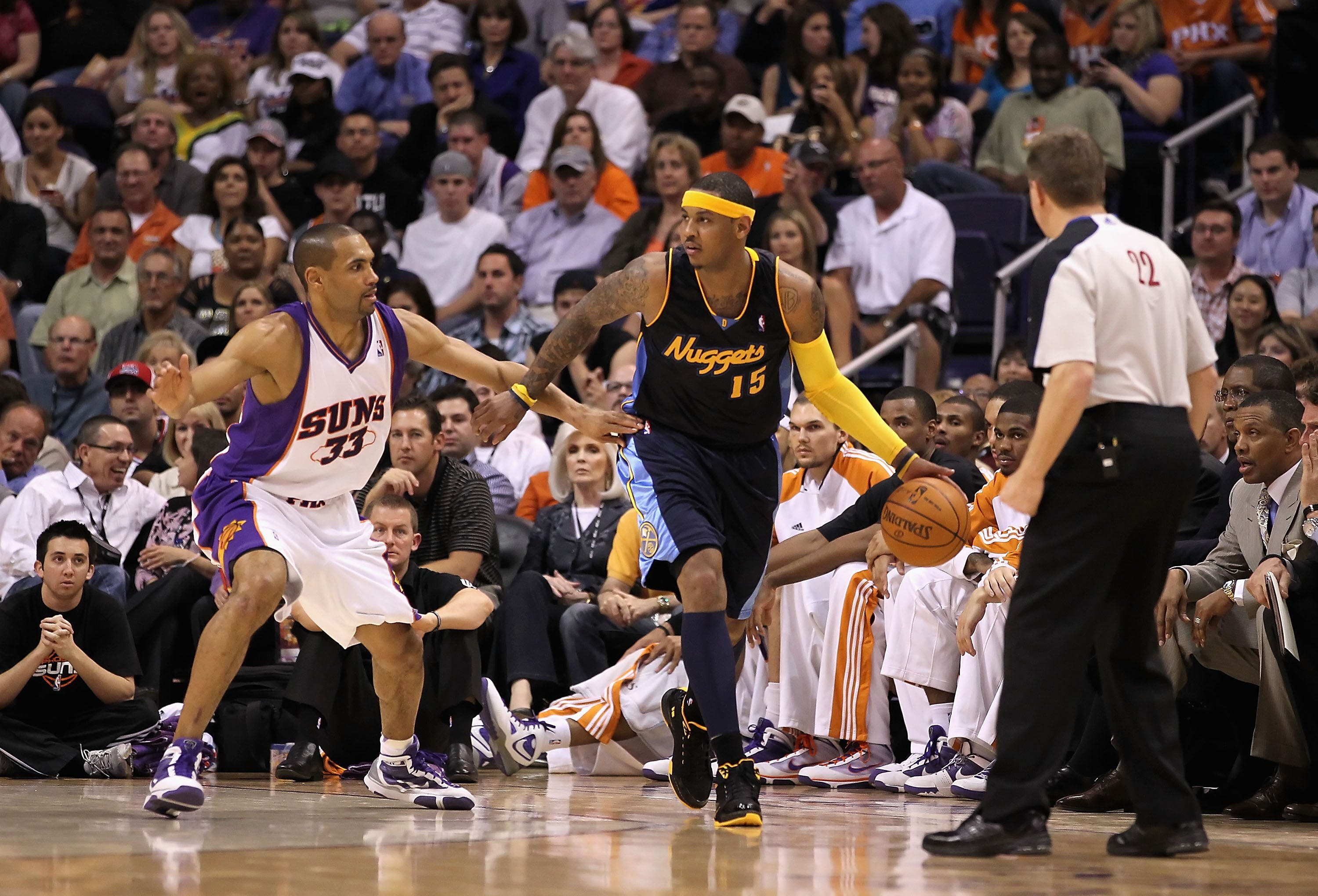 PHOENIX - APRIL 13:  Carmelo Anthony #15 of the Denver Nuggets handles the ball during the NBA game against the Phoenix Suns at US Airways Center on April 13, 2010 in Phoenix, Arizona. The Suns defeated the Nuggets 123-101.  NOTE TO USER: User expressly a