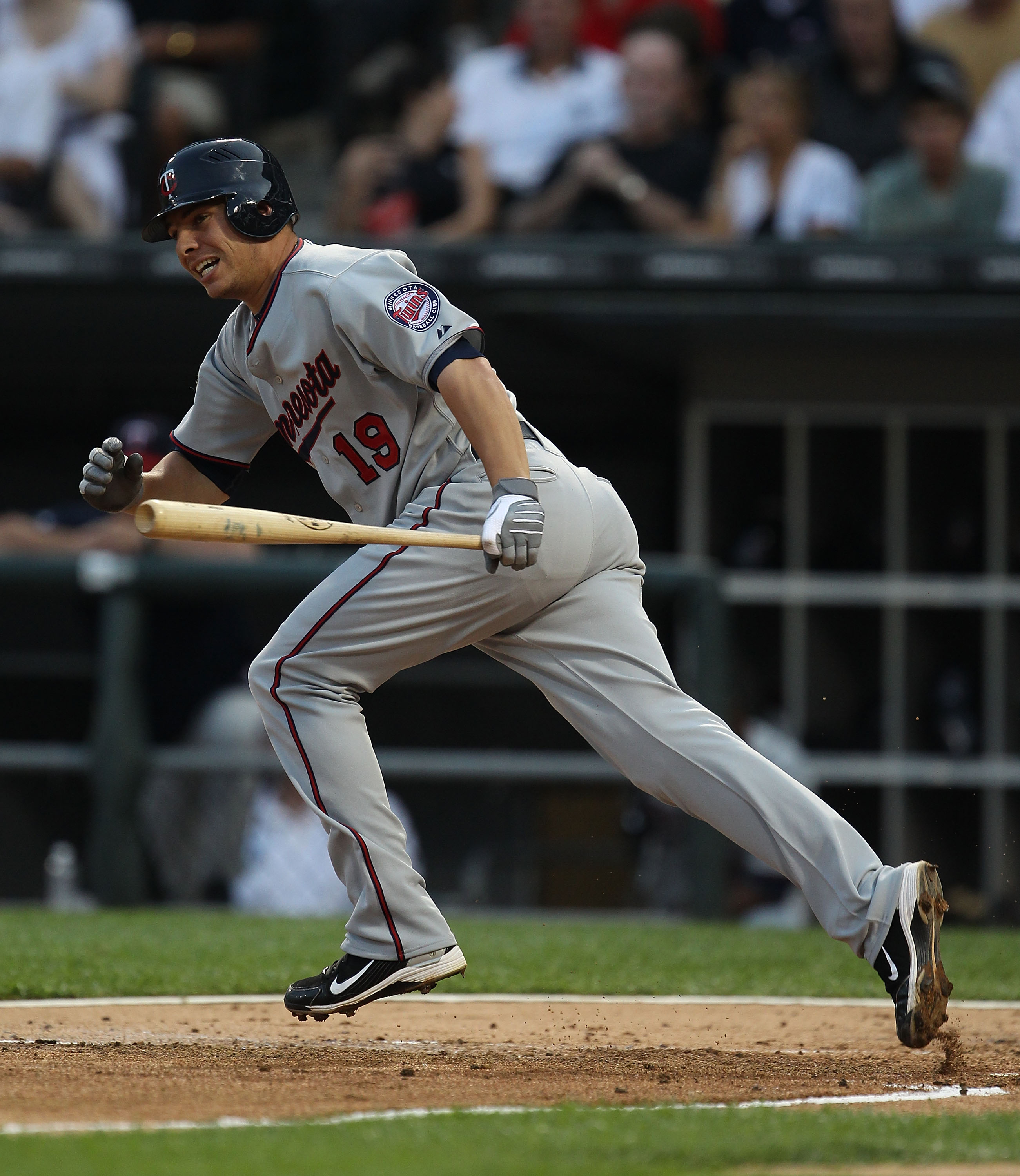 CHICAGO - AUGUST 10: Danny Valencia #19 of the Minnesota Twins runs after hitting the ball against the Chicago White Sox at U.S. Cellular Field on August 10, 2010 in Chicago, Illinois. The Twins defeated the White Sox 12-6. (Photo by Jonathan Daniel/Getty