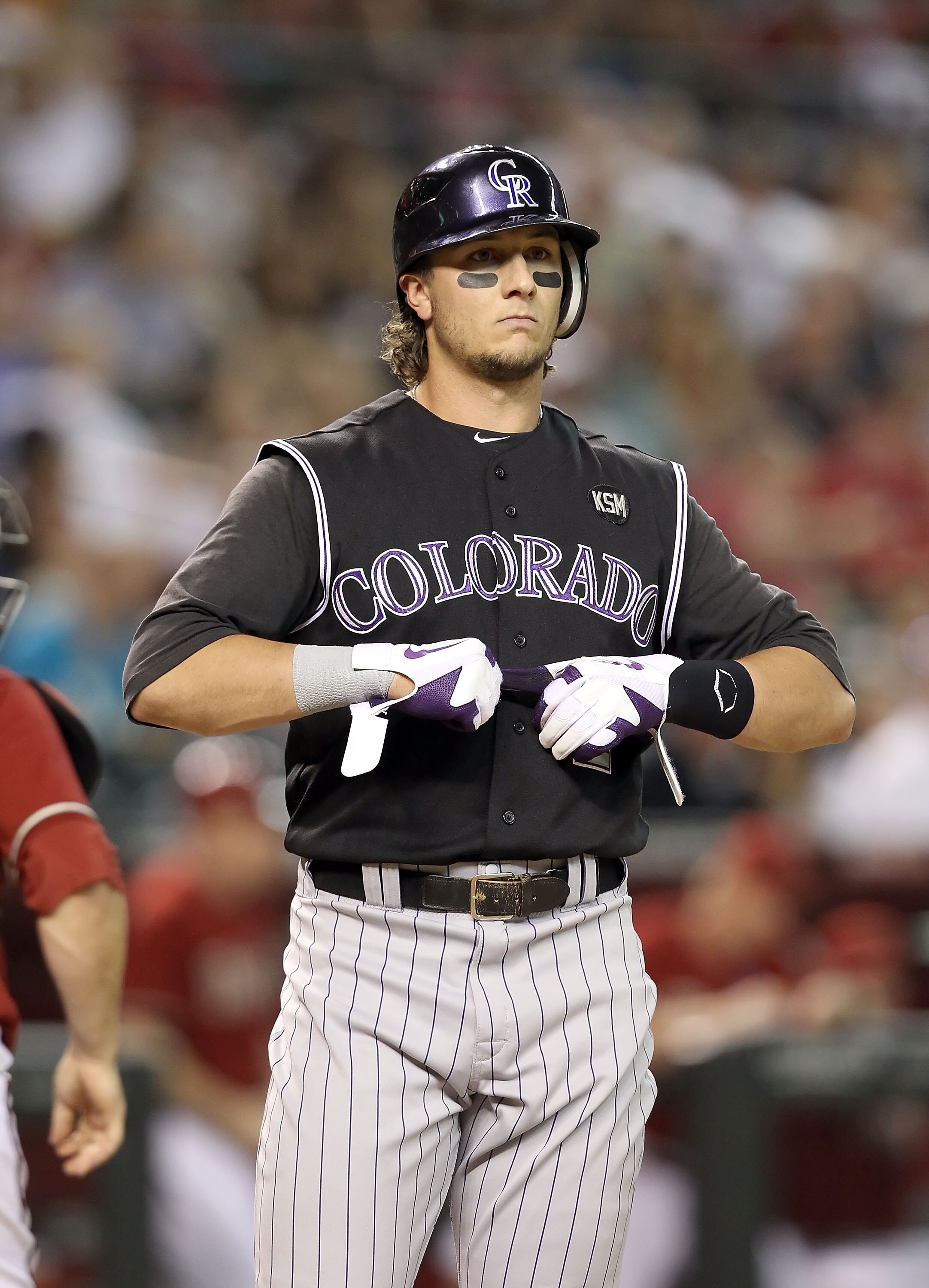 PHOENIX - SEPTEMBER 22: Troy Tulowitzki #2 of the Colorado Rockies reacts after striking out during the Major League Baseball game against the Arizona Diamondbacks at Chase Field on September 22, 2010 in Phoenix, Arizona.  (Photo by Christian Petersen/Get