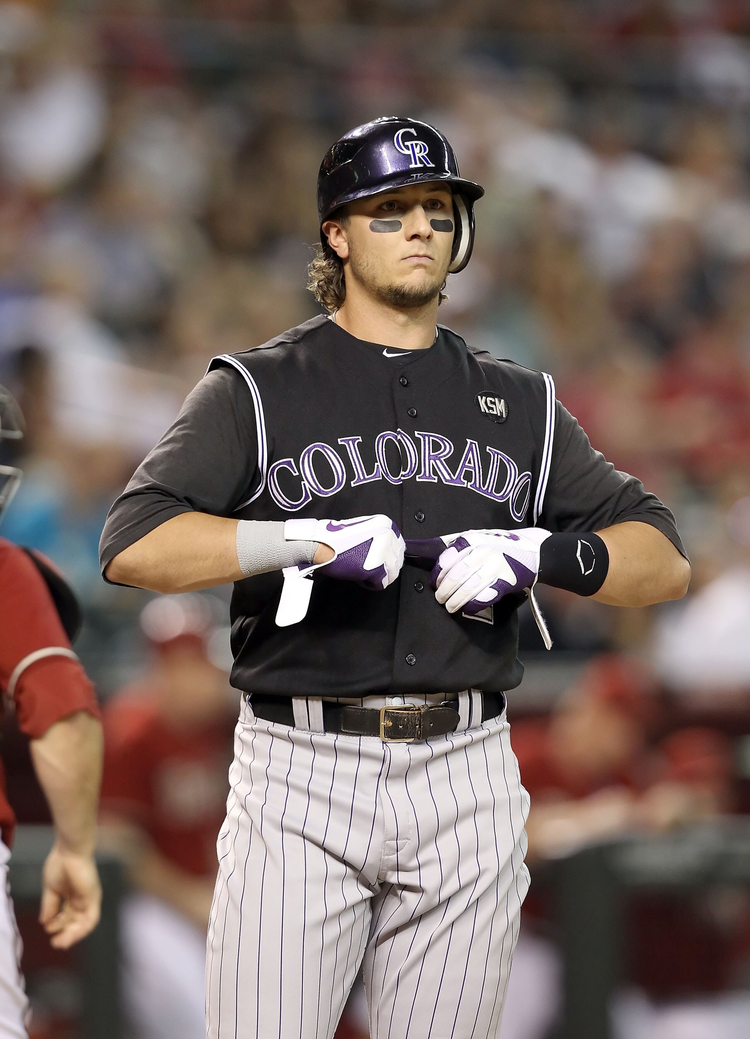 PHOENIX - SEPTEMBER 22: Troy Tulowitzki #2 of the Colorado Rockies reacts after striking out during the Major League Baseball game against the Arizona Diamondbacks at Chase Field on September 22, 2010 in Phoenix, Arizona.  (Photo by Christian Petersen/Get