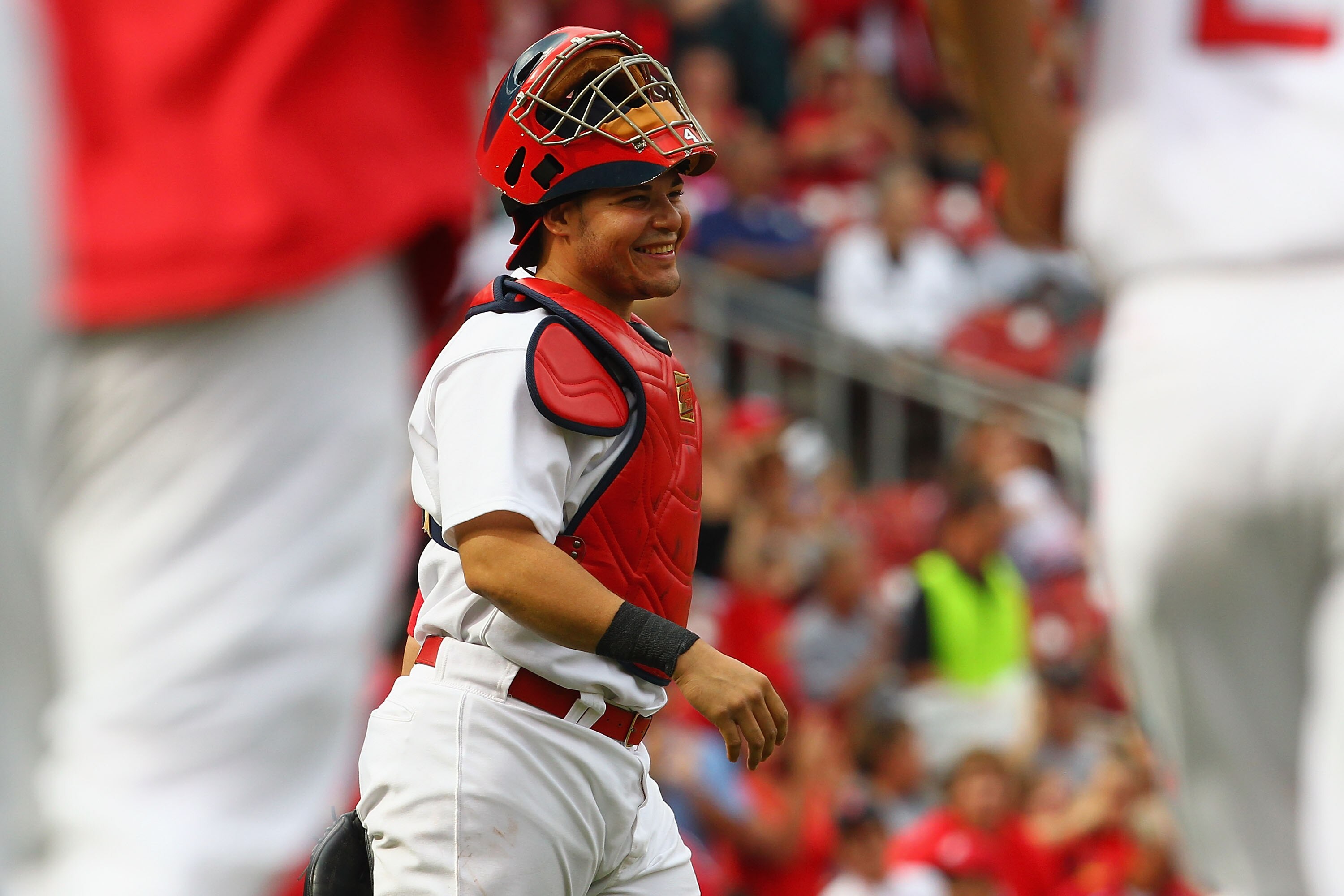ST. LOUIS - SEPTEMBER 19: Yadier Molina #4 of the St. Louis Cardinals smiles after beating the San Diego Padres at Busch Stadium on September 19, 2010 in St. Louis, Missouri.  The Cardinals beat the Padres 4-1.  (Photo by Dilip Vishwanat/Getty Images)
