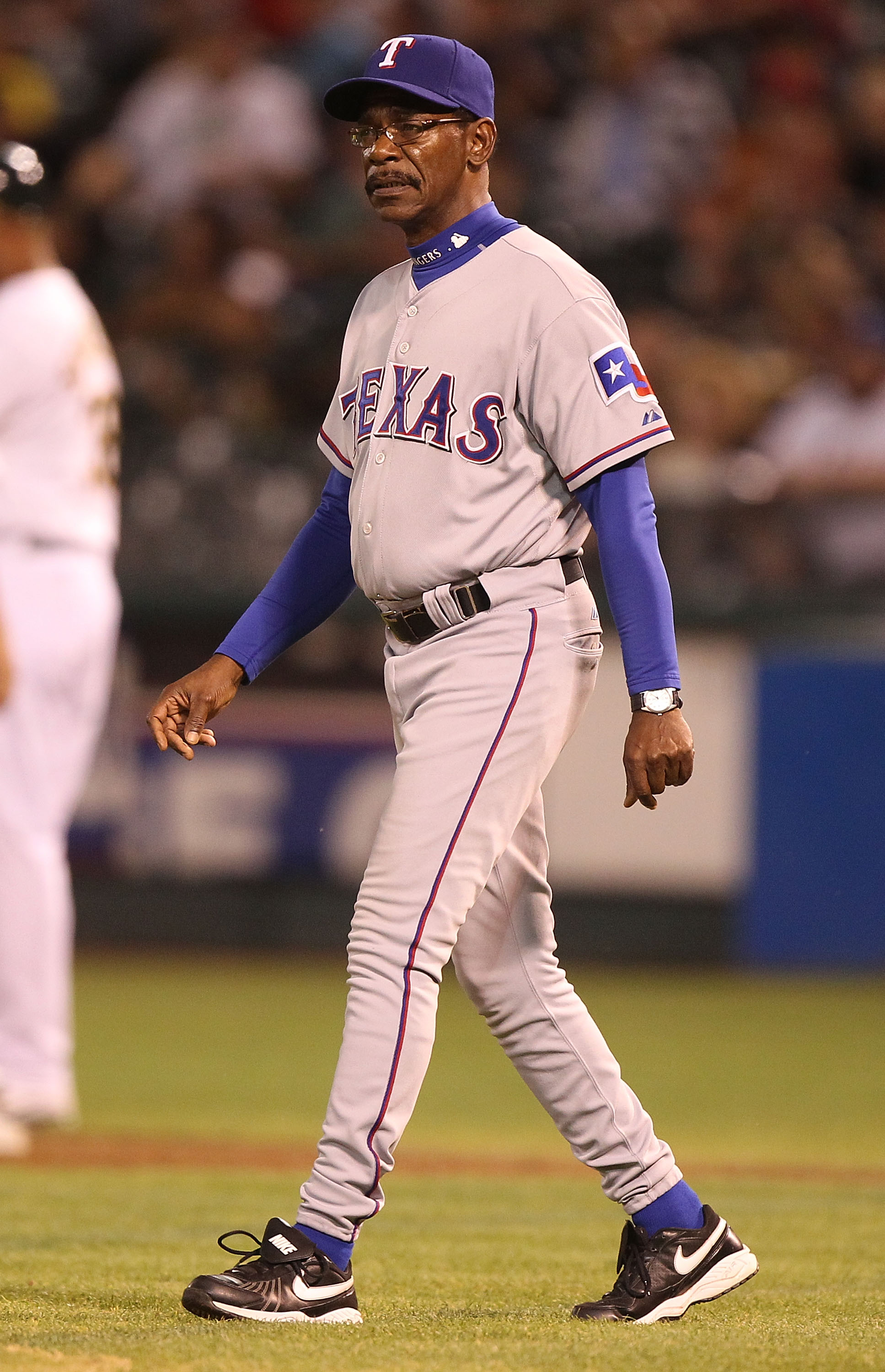 OAKLAND, CA - SEPTEMBER 24:  Manager Ron Washington of the Texas Rangers looks on against the Oakland Athletics during a Major League Baseball game at the Oakland-Alameda County Coliseum on September 24, 2010 in Oakland, California.  (Photo by Jed Jacobso