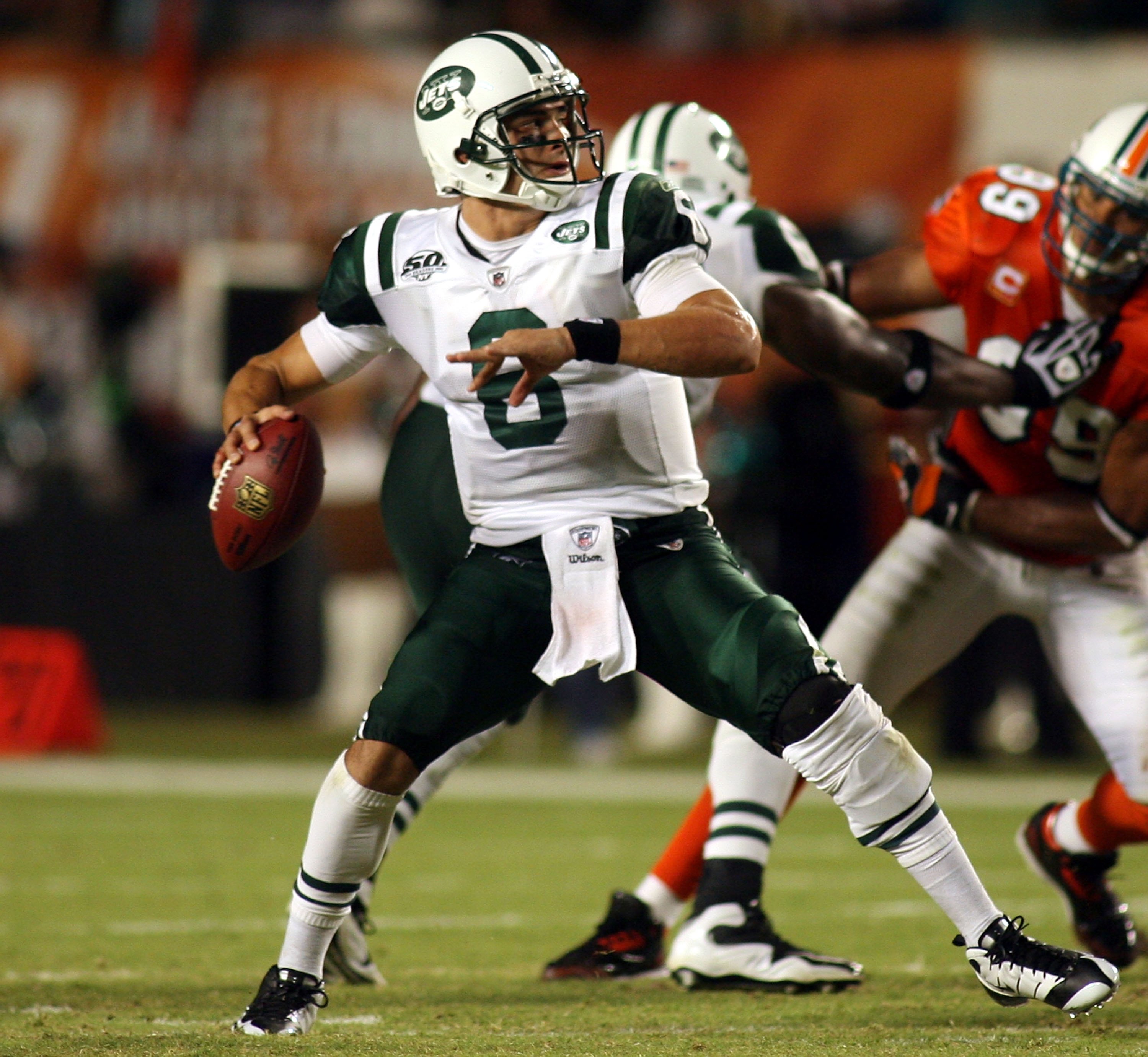 MIAMI - OCTOBER 12: Quarterback Mark Sanchez #6 of the New York Jets scrambles against the Miami Dolphins at Land Shark Stadium on October 12, 2009 in Miami, Florida. Miami defeated New York 31-27. (Photo by Marc Serota/Getty Images) MIAMI - OCTOBER 12: Quarterback Mark Sanchez #6 of the New York Jets scrambles against the Miami Dolphins at Land Shark Stadium on October 12, 2009 in Miami, Florida. Miami defeated New York 31-27. (Photo by Marc Serota/Getty Images)