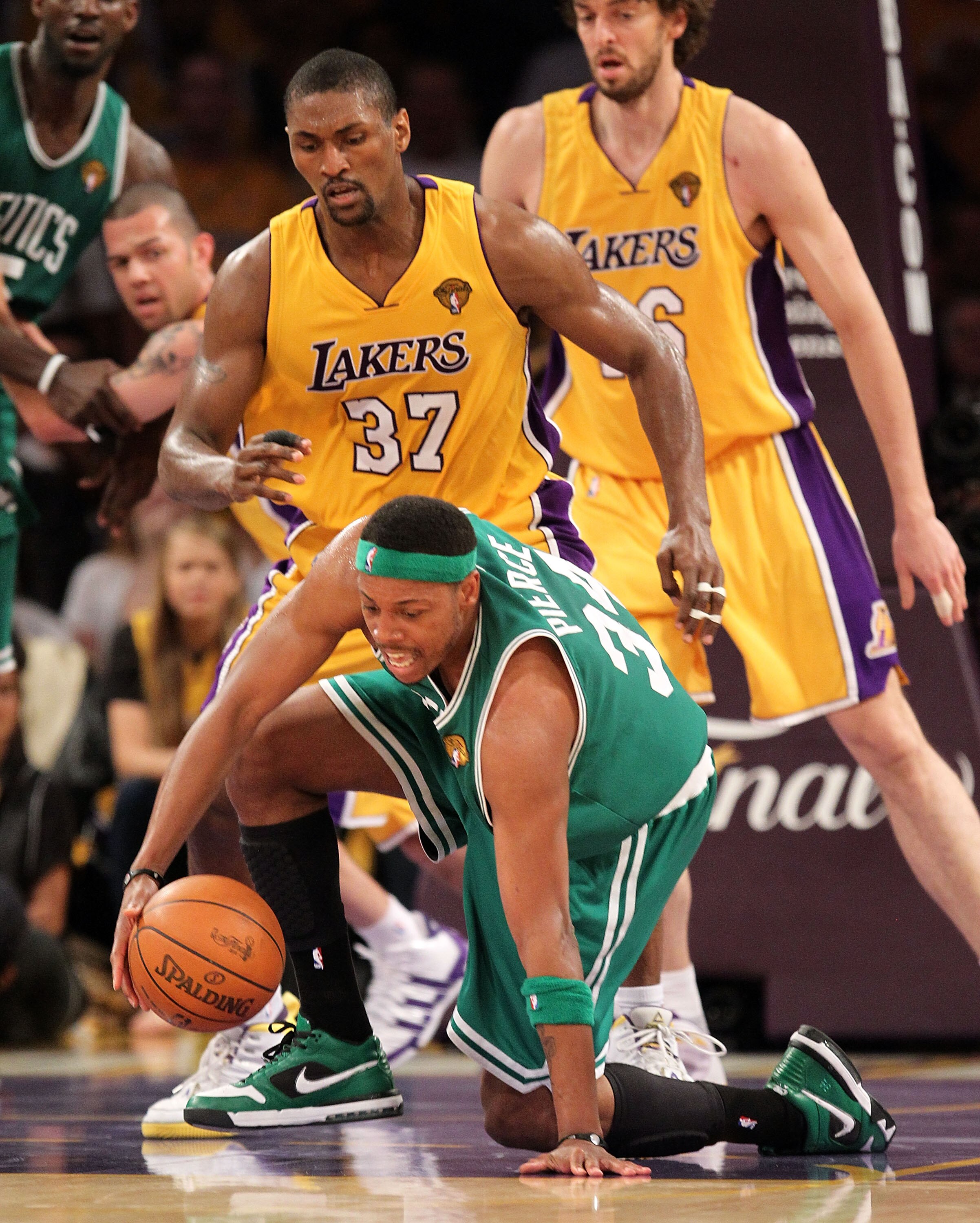 LOS ANGELES, CA - JUNE 17:  Paul Pierce #34 of the Boston Celtics tries to hold on to the ball under pressure from Ron Artest #37 of the Los Angeles Lakers in Game Seven of the 2010 NBA Finals at Staples Center on June 17, 2010 in Los Angeles, California.