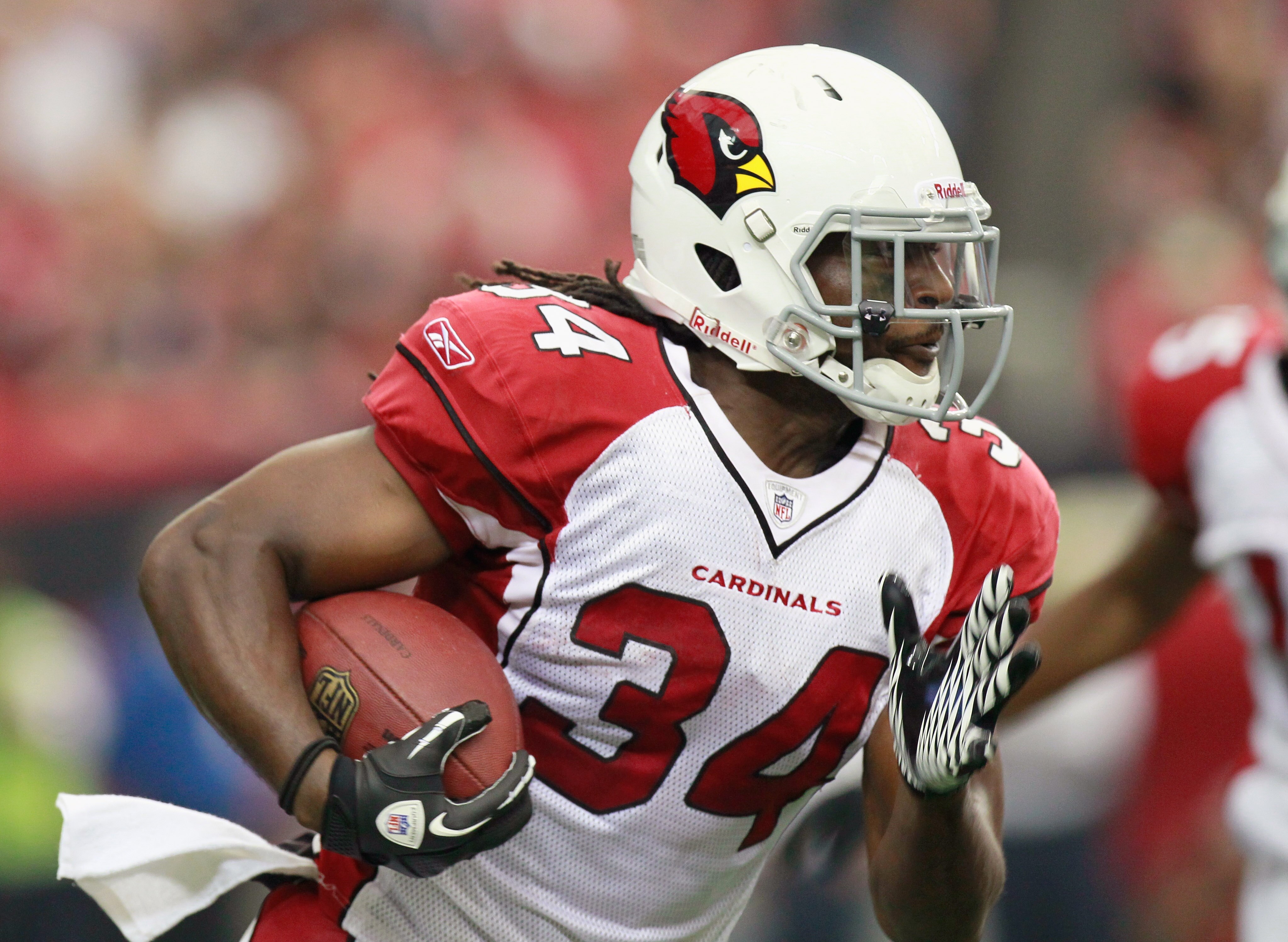 ATLANTA - SEPTEMBER 19:  Tim Hightower #34 of the Arizona Cardinals rushes upfield for a touchdown against the Atlanta Falcons at Georgia Dome on September 19, 2010 in Atlanta, Georgia.  (Photo by Kevin C. Cox/Getty Images)