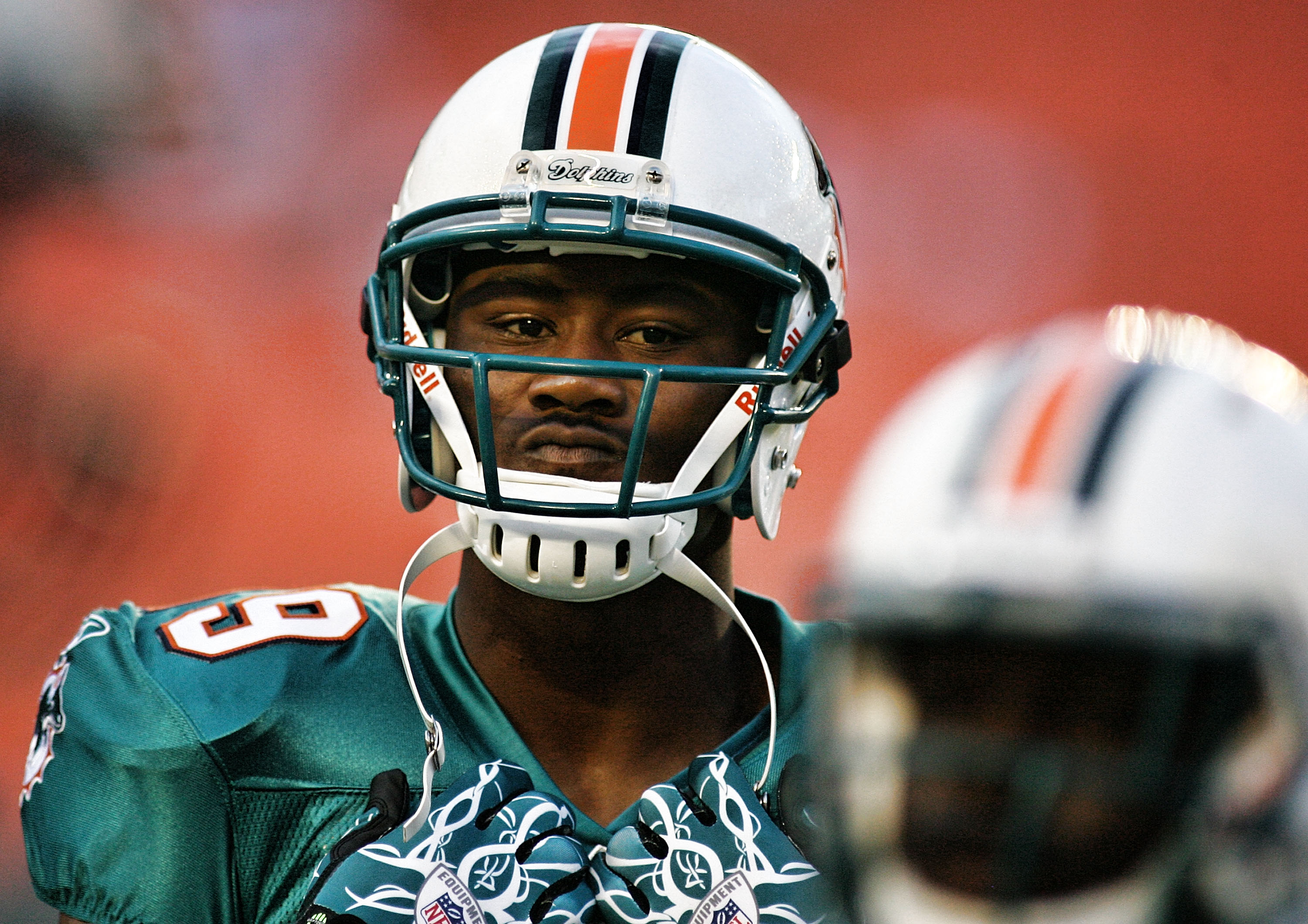 MIAMI - AUGUST 14: Wide Receiver Brandon Marshall #19 of the Miami Dolphins warms up prior to playing the Tampa Bay Buccaneers in a preseason game at Sun Life Stadium on August 14, 2010 in Miami, Florida. (Photo by Marc Serota/Getty Images) MIAMI - AUGUST 14: Wide Receiver Brandon Marshall #19 of the Miami Dolphins warms up prior to playing the Tampa Bay Buccaneers in a preseason game at Sun Life Stadium on August 14, 2010 in Miami, Florida. (Photo by Marc Serota/Getty Images)