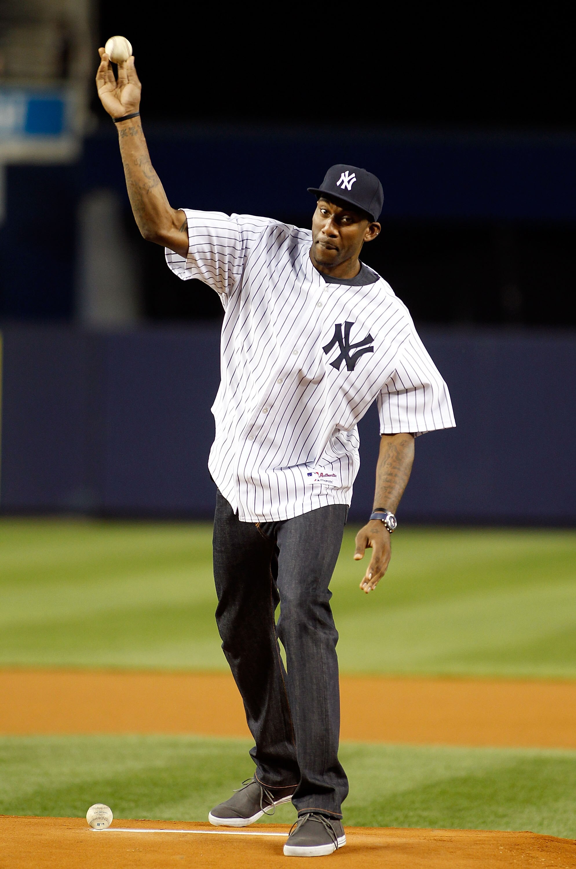 NEW YORK - SEPTEMBER 23:  Amar'e Stoudemire of the New York Knicks throws out the first pitch prior to the game between the New York Yankees and the Tampa Bay Rays on September 23, 2010 at Yankee Stadium in the Bronx borough of New York City.  (Photo by M
