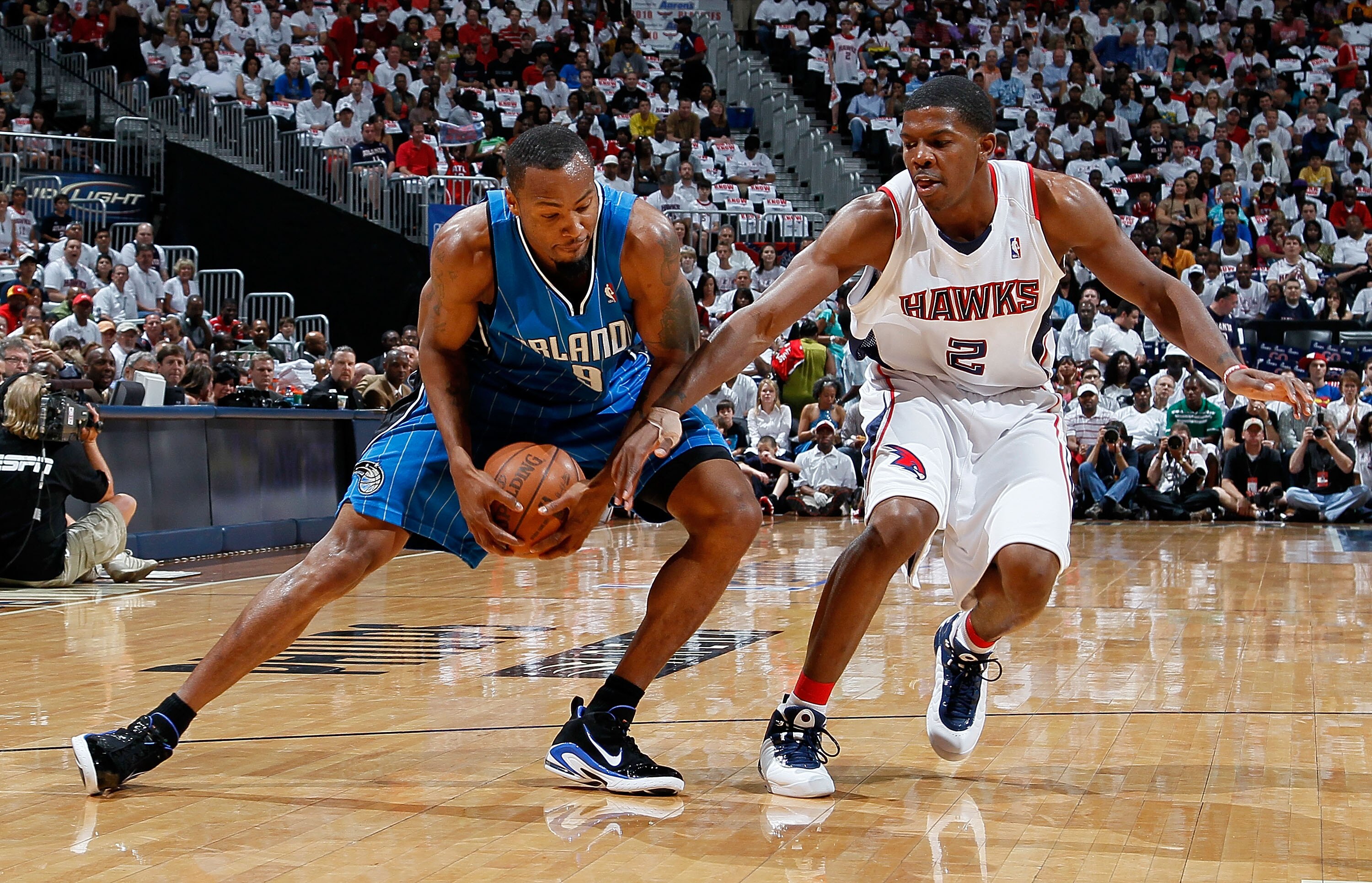 ATLANTA - MAY 08:  Joe Johnson #2 of the Atlanta Hawks defends against Rashard Lewis #9 of the Orlando Magic during Game Three of the Eastern Conference Semifinals during the 2010 NBA Playoffs at Philips Arena on May 8, 2010 in Atlanta, Georgia.  NOTE TO 