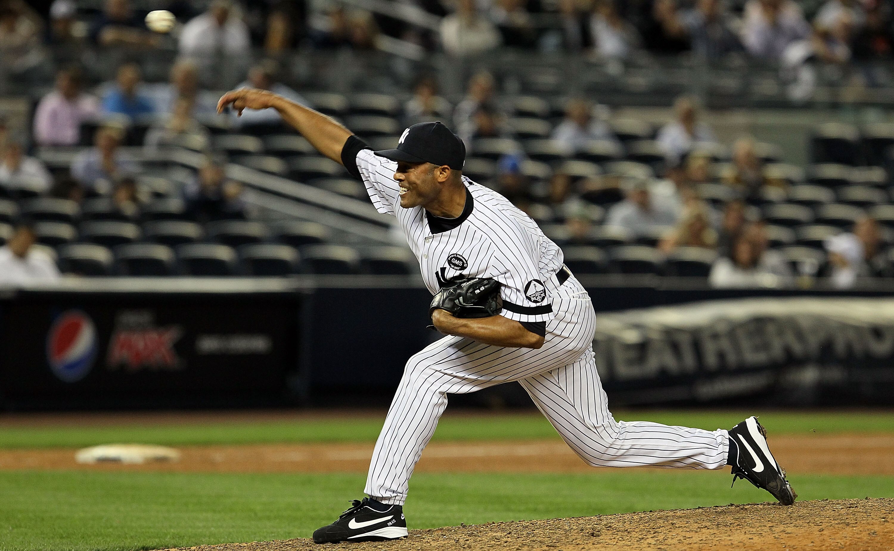 NEW YORK - SEPTEMBER 20: Mariano Rivera #42 of the New York Yankees delivers a pitch against the Tampa Bay Rays on September 20, 2010 at Yankee Stadium in the Bronx borough of New York City. The Yankees defeated the Rays 8-6. (Photo by Jim McIsaac/Getty NEW YORK - SEPTEMBER 20: Mariano Rivera #42 of the New York Yankees delivers a pitch against the Tampa Bay Rays on September 20, 2010 at Yankee Stadium in the Bronx borough of New York City. The Yankees defeated the Rays 8-6. (Photo by Jim McIsaac/Getty
