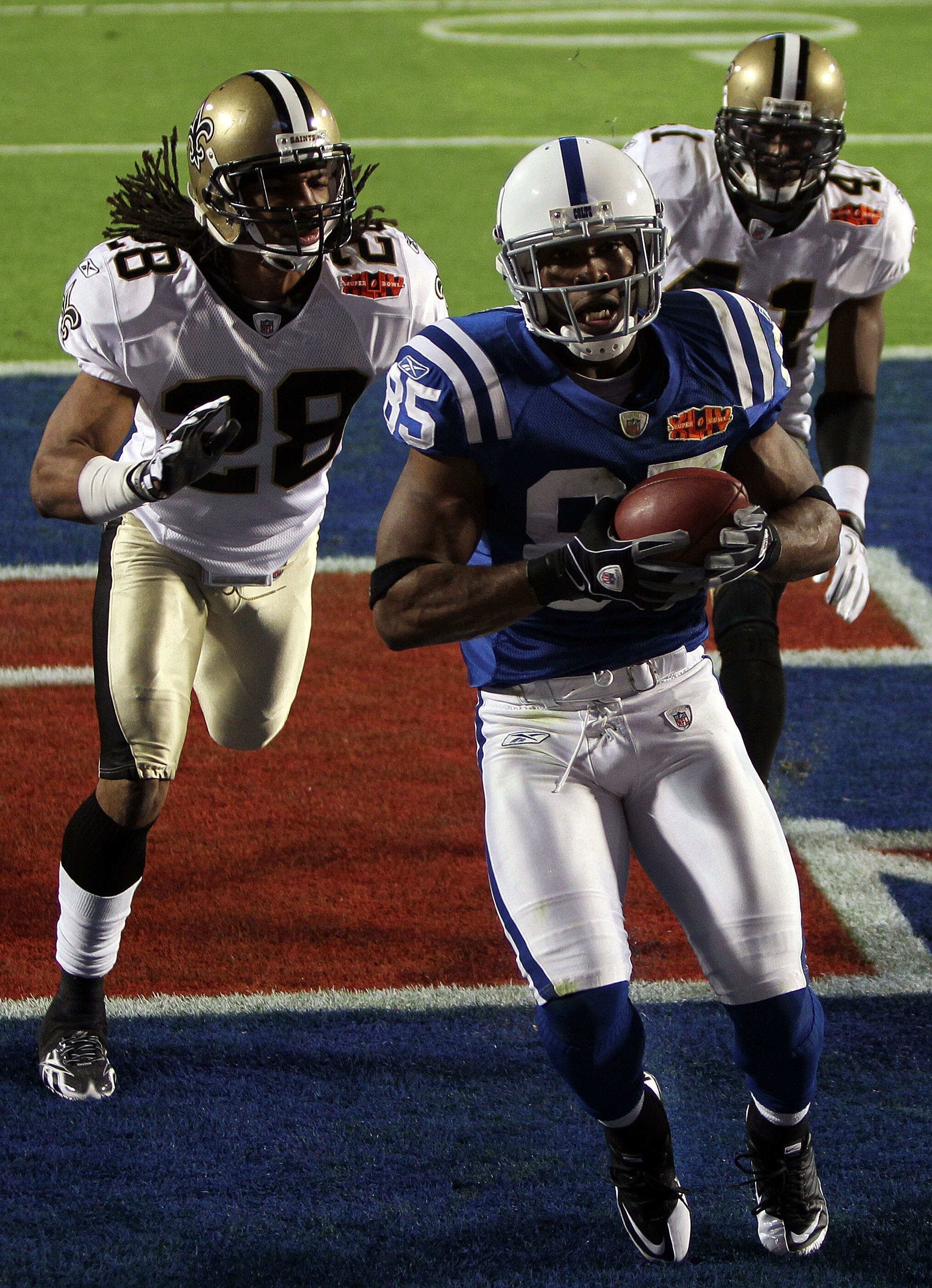 MIAMI GARDENS, FL - FEBRUARY 07:  Pierre Garcon #85 of the Indianapolis Colts makes a catch for a touchdown against the New Orleans Saints during the first quarter Super Bowl XLIV on February 7, 2010 at Sun Life Stadium in Miami Gardens, Florida.  (Photo 