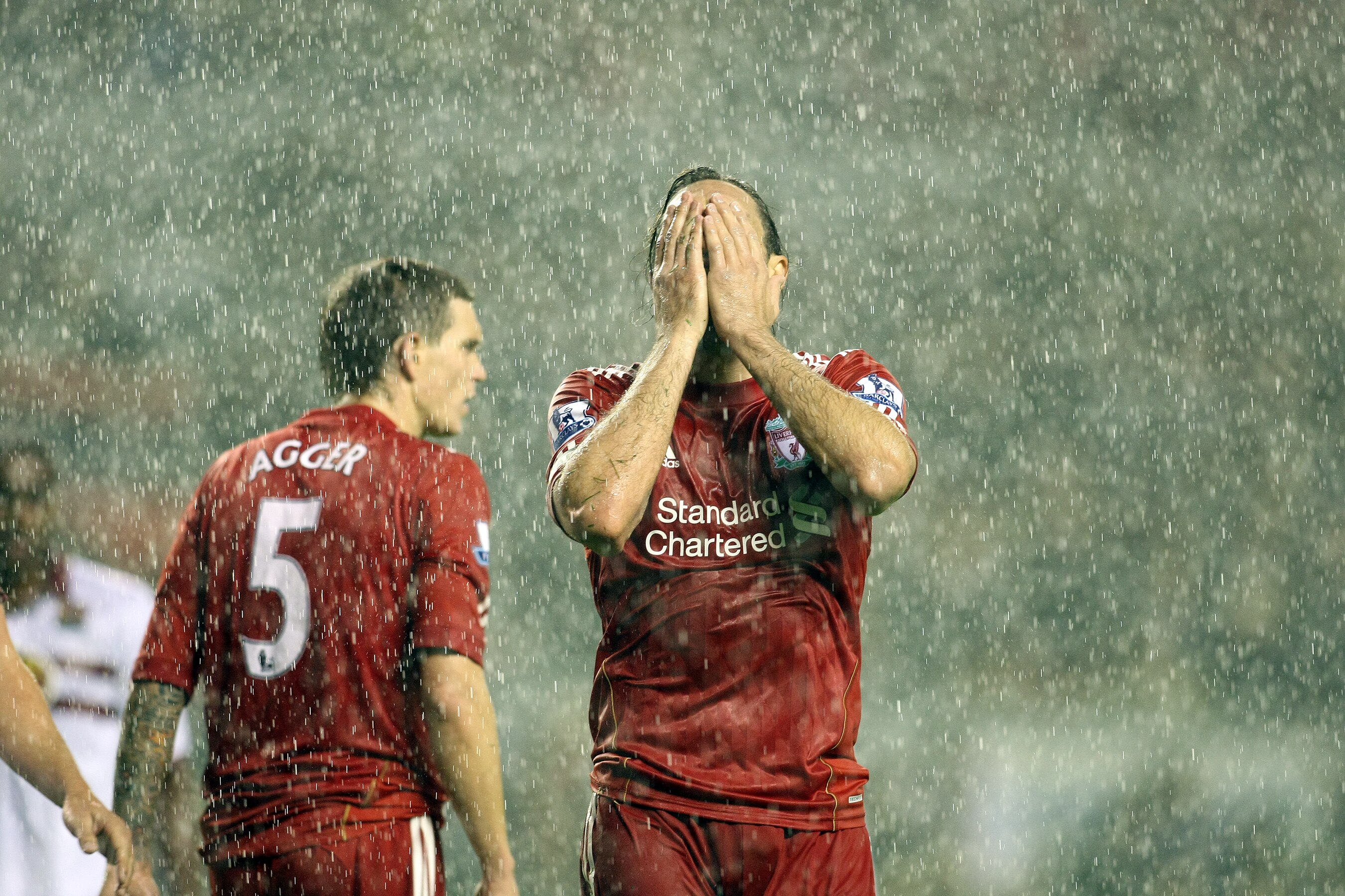 LIVERPOOL, ENGLAND - SEPTEMBER 22:  Sotiros Kyrgiakos of Liverpool holds his head after a shot had gone wide of the goal during the Carling Cup Third Round match between Liverpool and Northampton Town at Anfield on September 22, 2010 in Liverpool, England