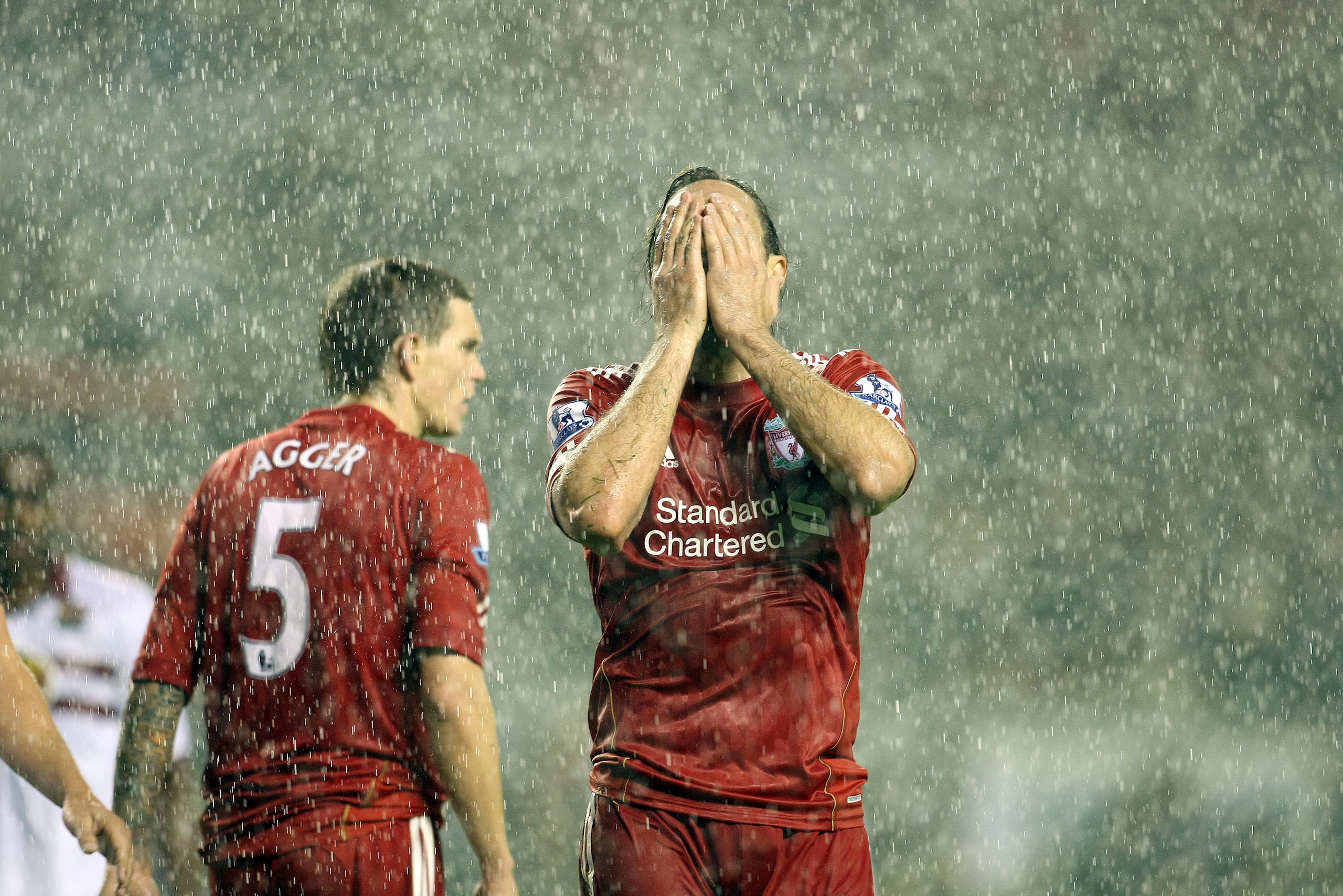 LIVERPOOL, ENGLAND - SEPTEMBER 22:  Sotiros Kyrgiakos of Liverpool holds his head after a shot had gone wide of the goal during the Carling Cup Third Round match between Liverpool and Northampton Town at Anfield on September 22, 2010 in Liverpool, England
