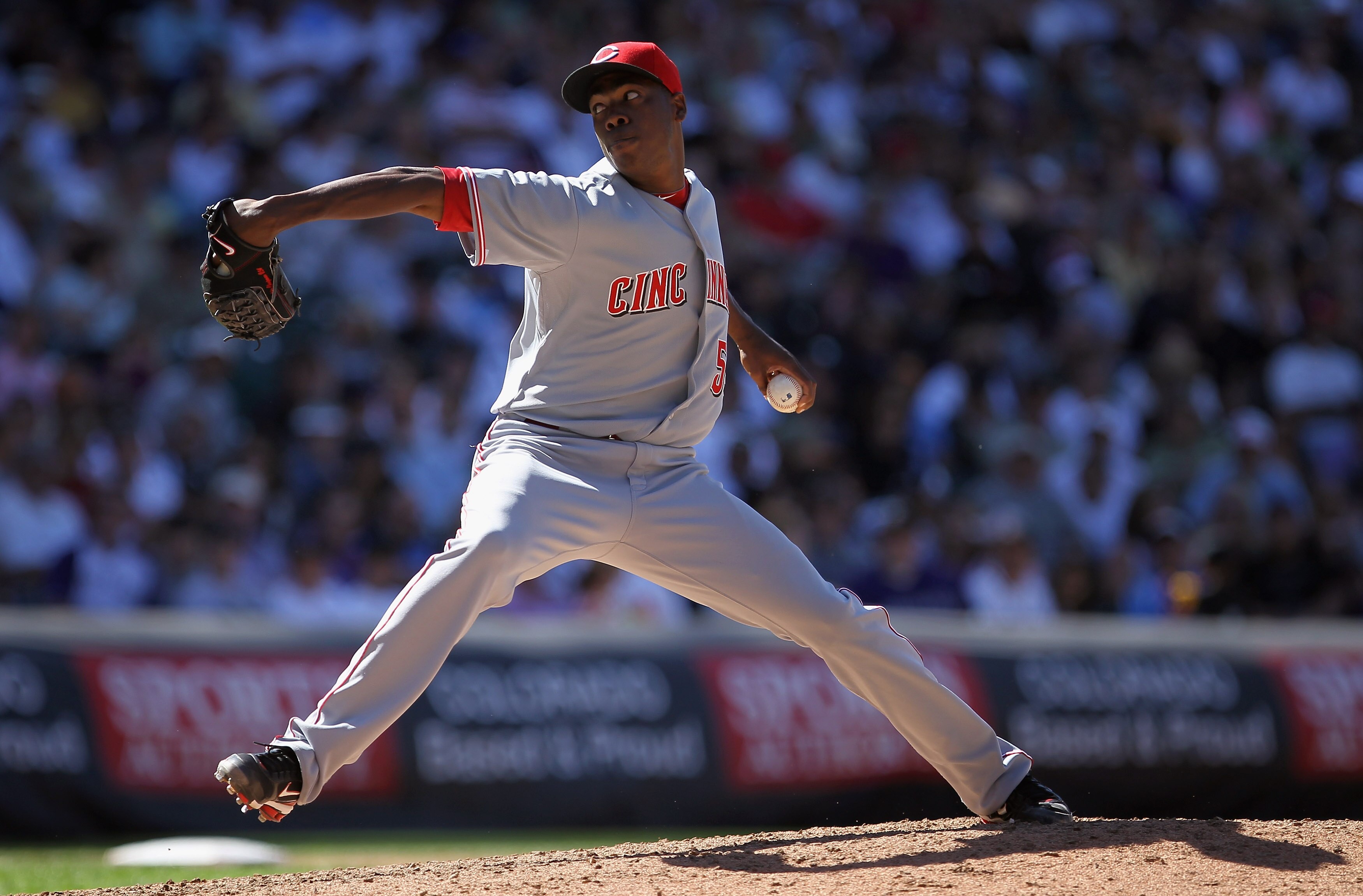 DENVER - SEPTEMBER 06:  Relief pitcher Aroldis Chapman #54 of the Cincinnati Reds delivers against the Colorado Rockies at Coors Field on September 6, 2010 in Denver, Colorado. The Rockies defeated the Reds 10-5.  (Photo by Doug Pensinger/Getty Images)
