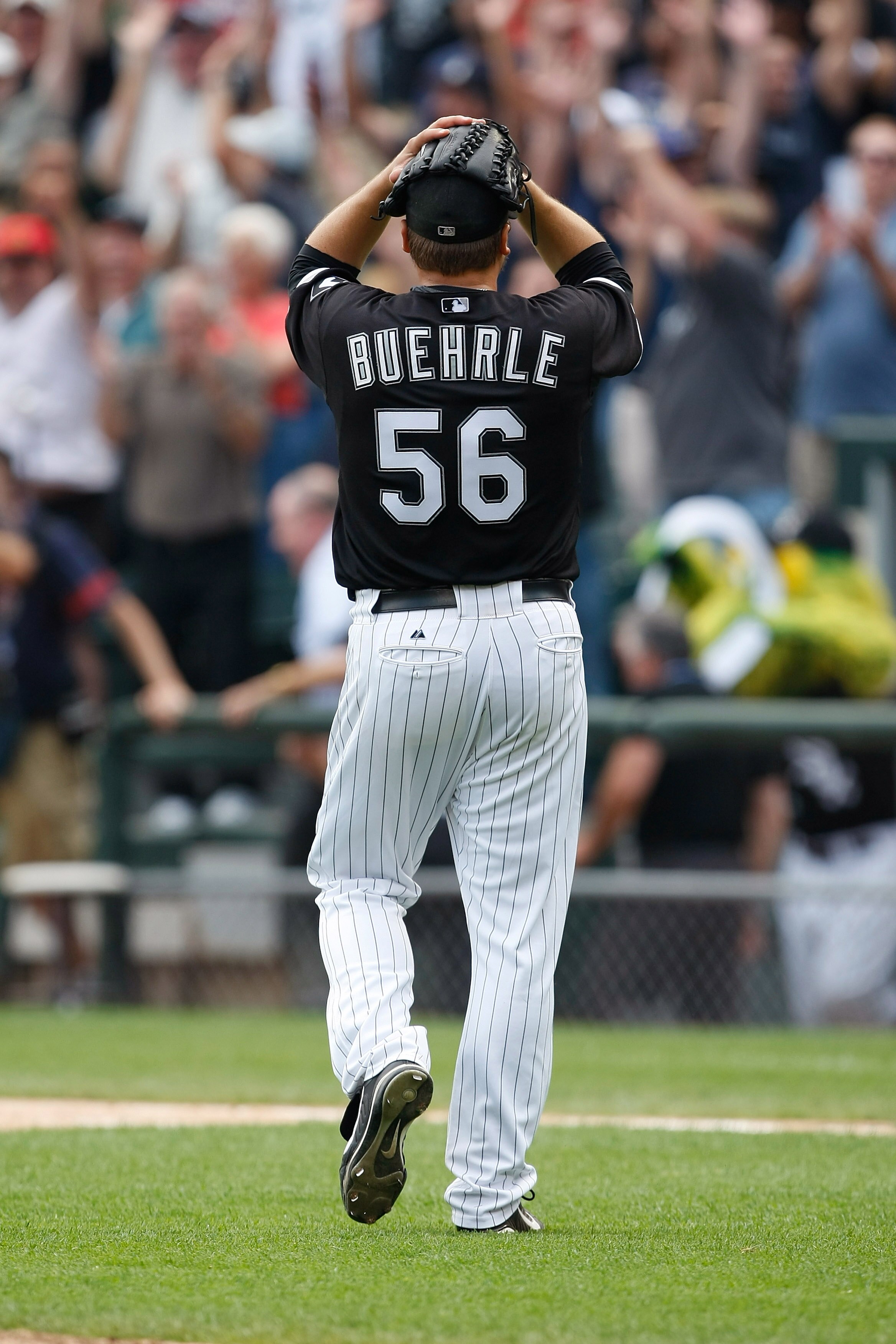 CHICAGO, IL - JULY 23: Pitcher Mark Buehrle #56 of the Chicago White Sox reacts in celebration after pitching a perfect game against the Tampa Bay Rays at U.S. Cellular Field on July 23, 2009 in Chicago, Illinois. The White Sox defeated the Rays 5-0, as B