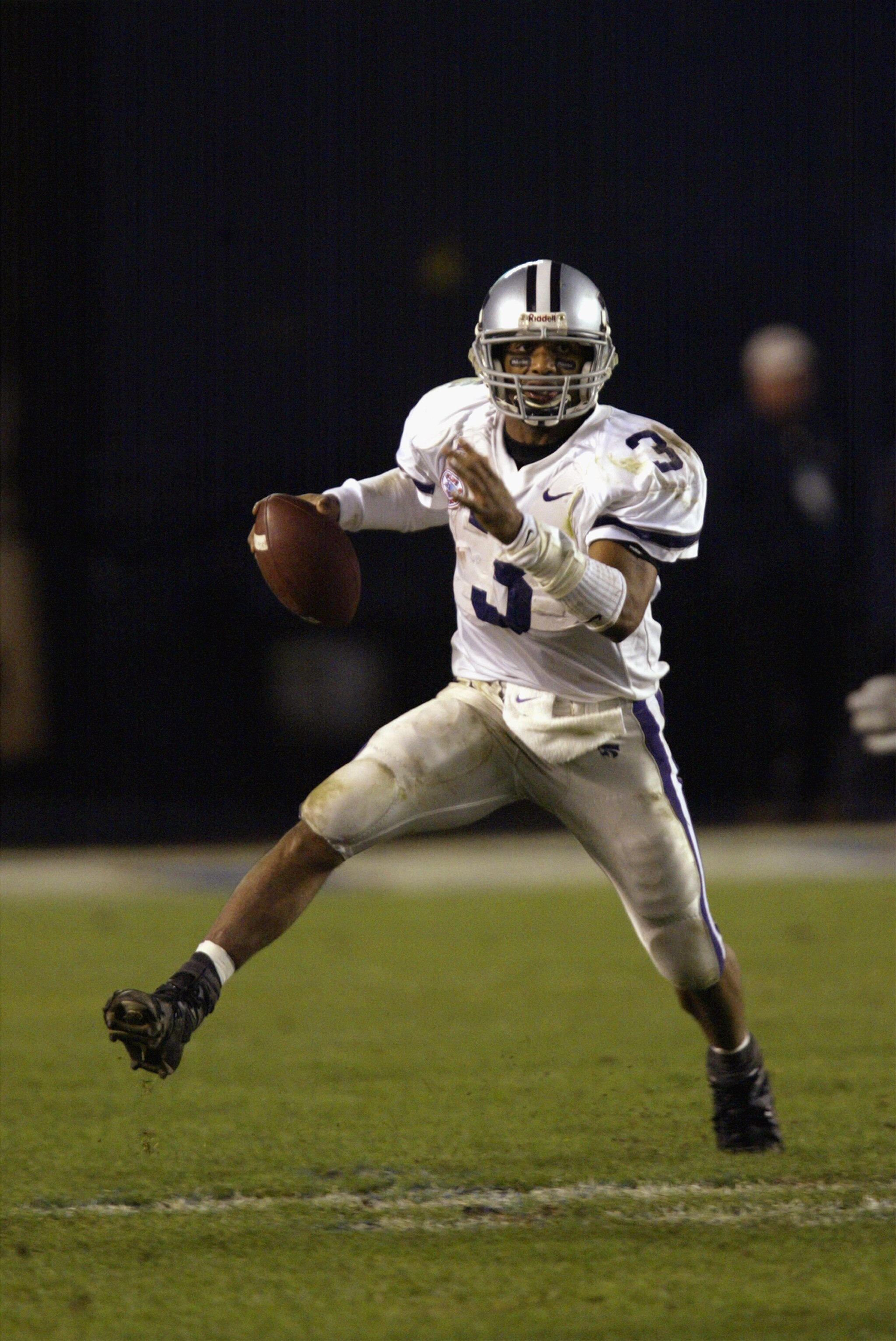SAN DIEGO - DECEMBER 27:  Quarterback Ell Roberson #3 of the Kansas State Wildcats scrambles during the Pacific Life Holiday Bowl against the Arizona State Sun Devils at Qualcomm Stadium on December 27, 2002 in San Diego, California.  The Wildcats defeate