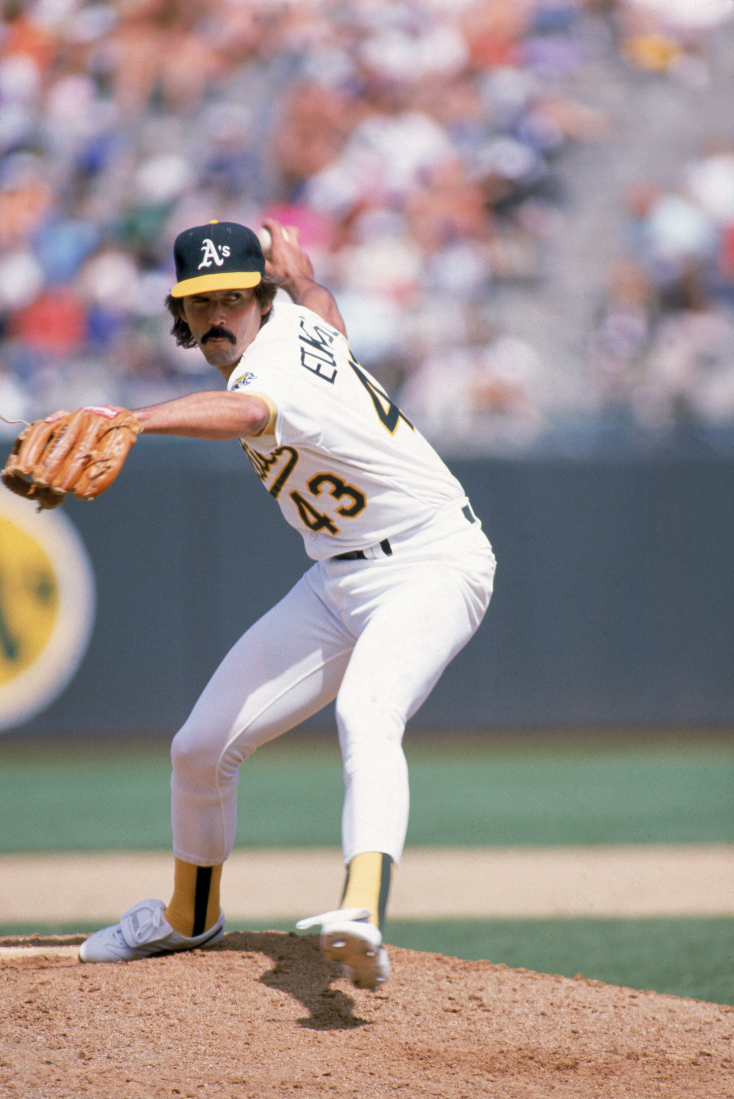 OAKLAND, CA - 1989:  Pitcher Dennis Eckersley #43 of the Oakland Athletics delivers during the 1989 season game at the Oakland-Alameda County Coliseum in Oakland, California.  (Photo by Otto Greule Jr/Getty Images)