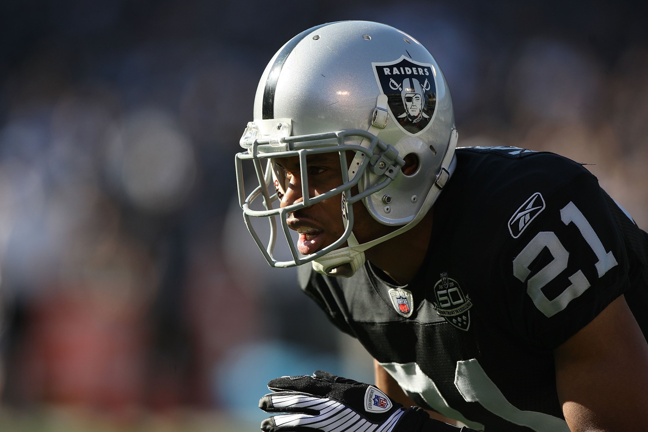 OAKLAND, CA - JANUARY 03:  Nnamdi Asomugha #21 of the Oakland Raiders in action against the Baltimore Ravens during an NFL game at Oakland-Alameda County Coliseum on January 3, 2010 in Oakland, California.  (Photo by Jed Jacobsohn/Getty Images)