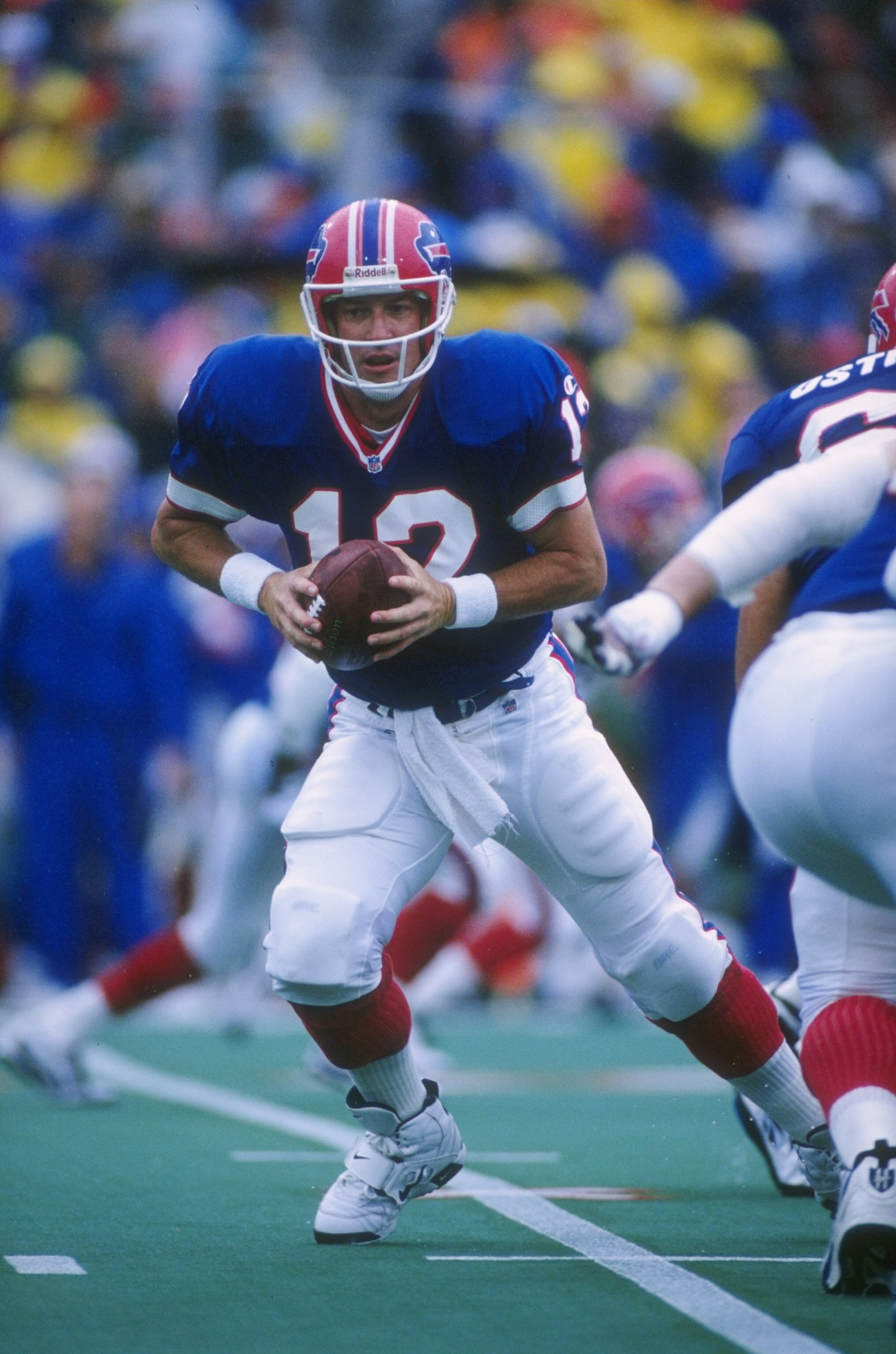 8 Sep 1996: Quarterback Jim Kelly of the Buffalo Bills drops back to pass during a play in the Bills 17-10 victory over the New England Patriots at Rich Stadium in Orchard Park, New York.