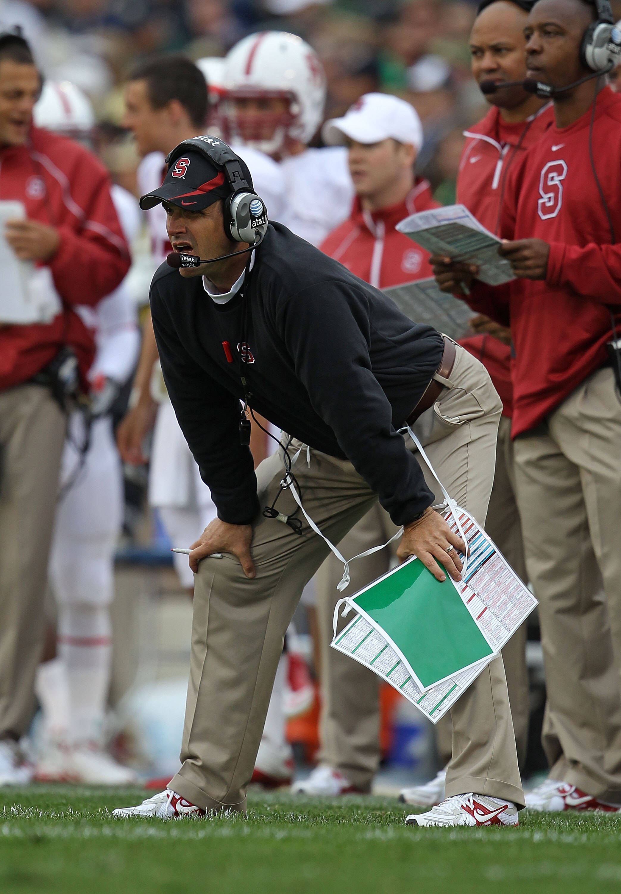 SOUTH BEND, IN - SEPTEMBER 25: Head coach Jim Harbaugh of the Stanford Cardinal watches as his team takes on the Notre Dame Fighting Irish at Notre Dame Stadium on September 25, 2010 in South Bend, Indiana. (Photo by Jonathan Daniel/Getty Images)