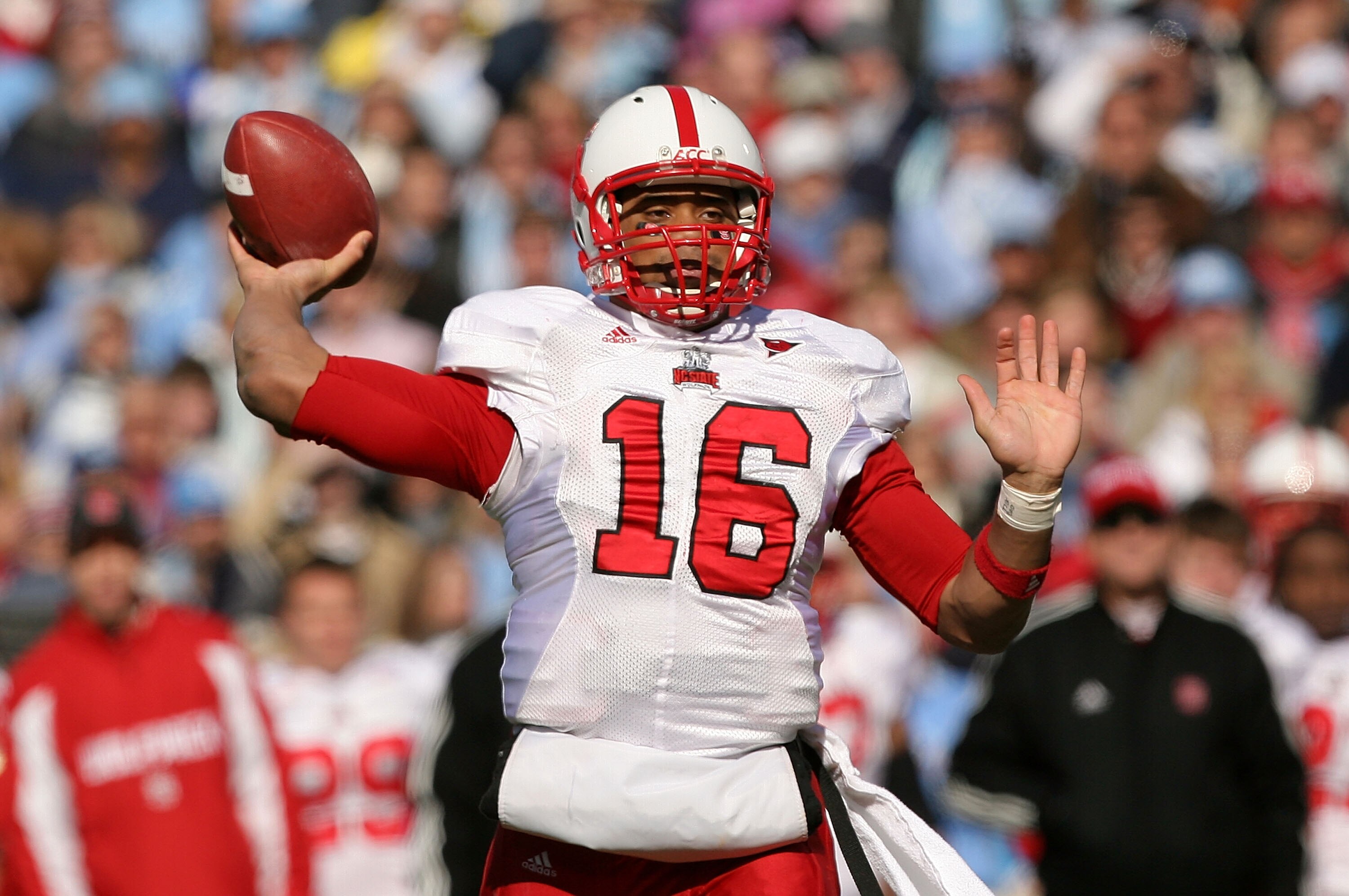 CHAPEL HILL, NC - NOVEMBER 22:  Russell Wilson #16 of the North Carolina State Wolfpack drops back to throw a pass against the North Carolina Tar Heels at Kenan Stadium on November 22, 2008 in Chapel Hill, North Carolina.  (Photo by Streeter Lecka/Getty I