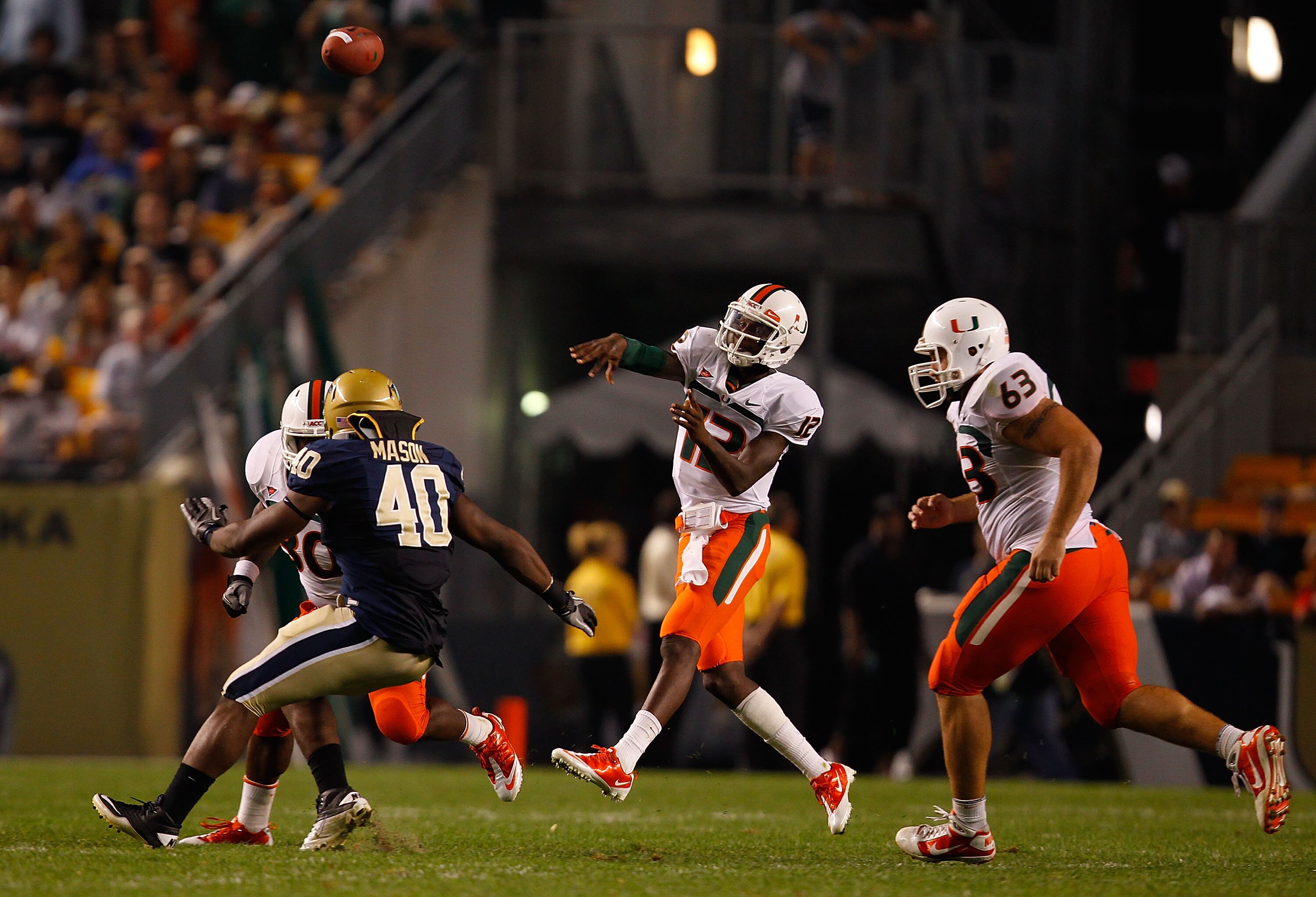 PITTSBURGH - SEPTEMBER 23:  Jacory Harris #12 of the Miami Hurricanes throws a pass against the Pittsburgh Panthers on September 23, 2010 at Heinz Field in Pittsburgh, Pennsylvania.  (Photo by Jared Wickerham/Getty Images)