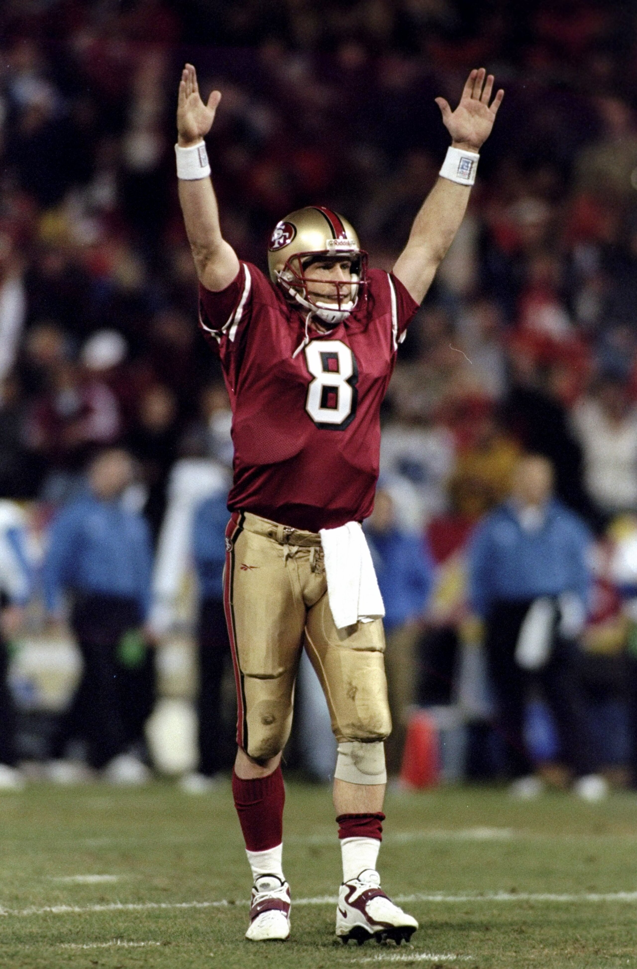 14 Dec 1998: Quarterback Steve Young #8 of the San Francisco 49ers celebrates during a game against the Detroit Lions at 3Com Park in San Francisco, California. The 49ers defeated the Lions 35-13.