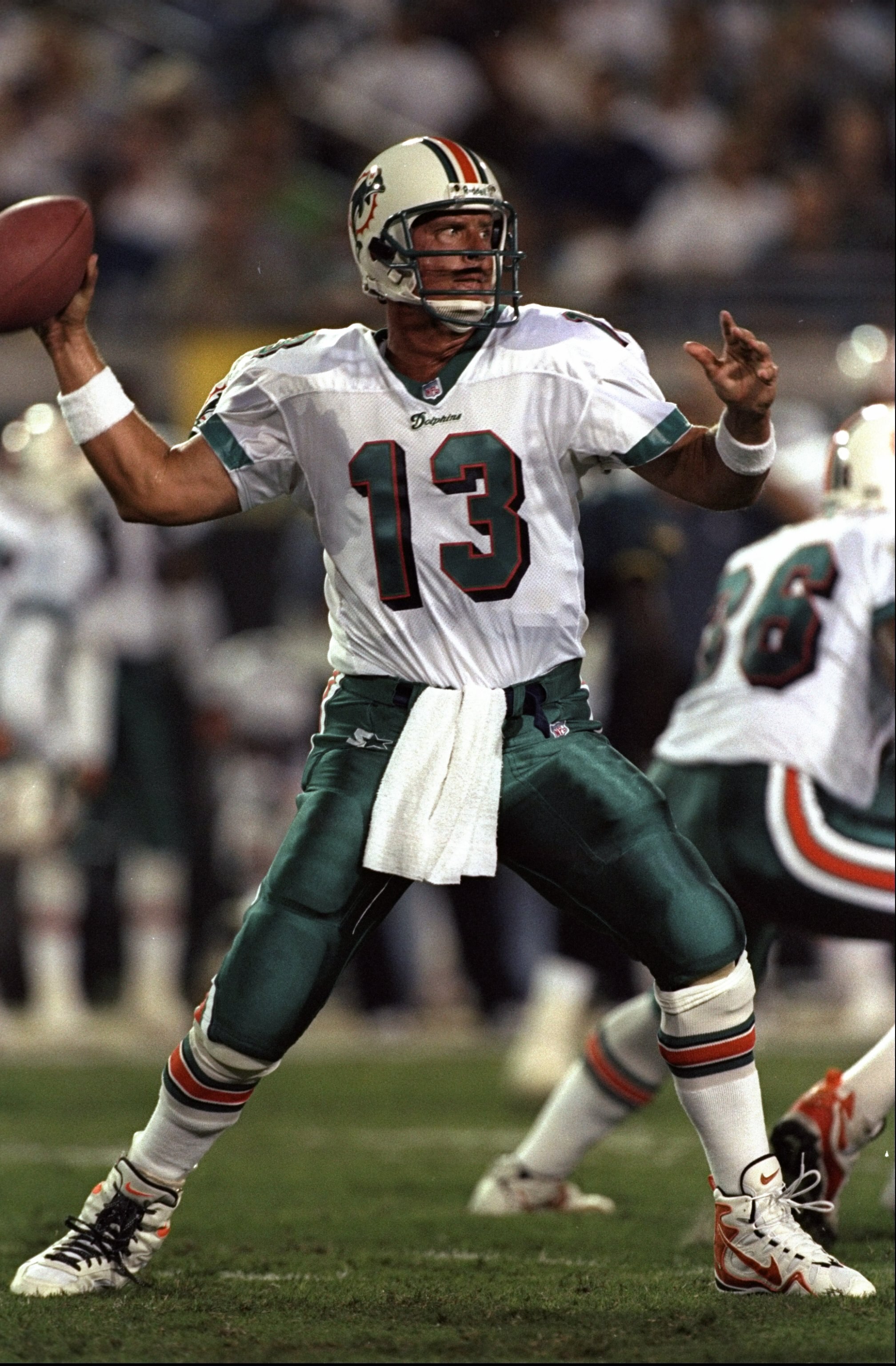 11 Oct 1998:  Quarterback Dan Marino #13 of the Miami Dolphins in action during a game against the Jacksonville Jaguars at the Alltel Stadium in Jacksonville, Florida. The Jaguars defeated the Dolphins 28-21. Mandatory Credit: Scott Halleran  /Allsport