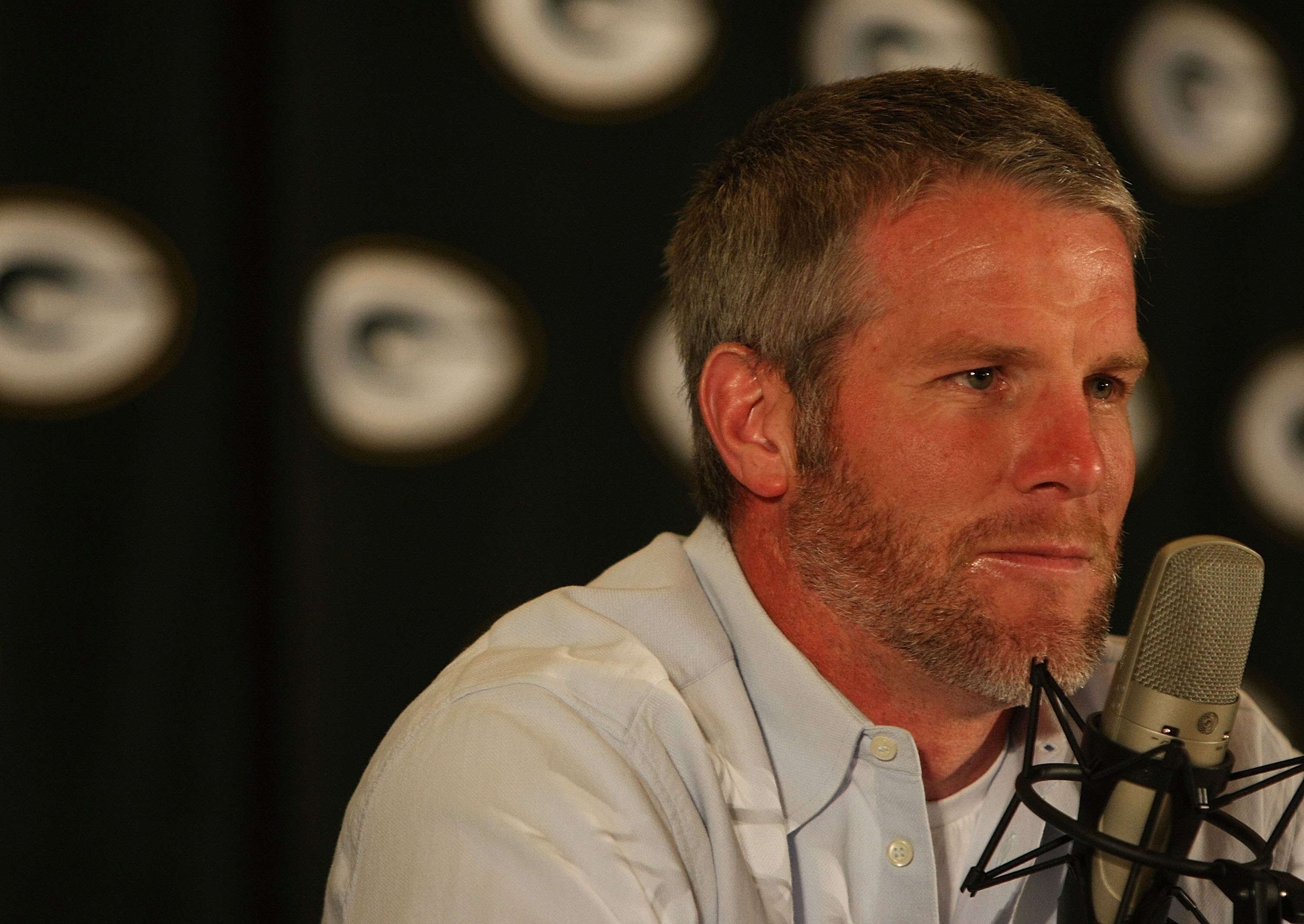 GREEN BAY, WI - MARCH 06: Quarterback Brett Favre of the Green Bay Packers listens to a question at his retirement press conference on March 6, 2008 at Lambeau Field in Green Bay, Wisconsin. (Photo by Jonathan Daniel/Getty Images)
