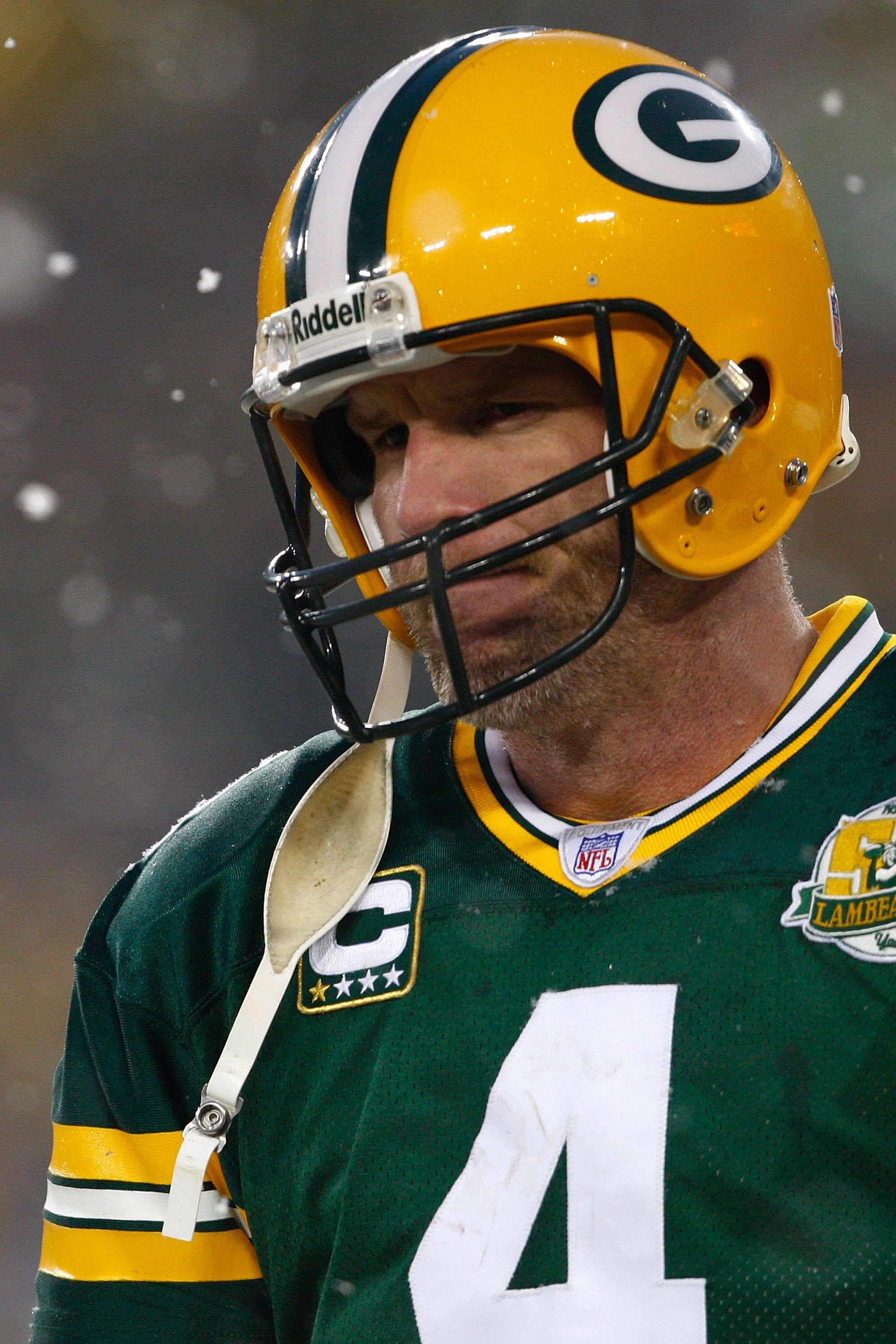 GREEN BAY, WI - JANUARY 12:  Quarterback Brett Favre #4 of the Green Bay Packers looks on against the Seattle Seahawks during the NFC divisional playoff game on January 12, 2008 at Lambeau Field in Green Bay, Wisconsin. The Packers defeated the Seahawks 4