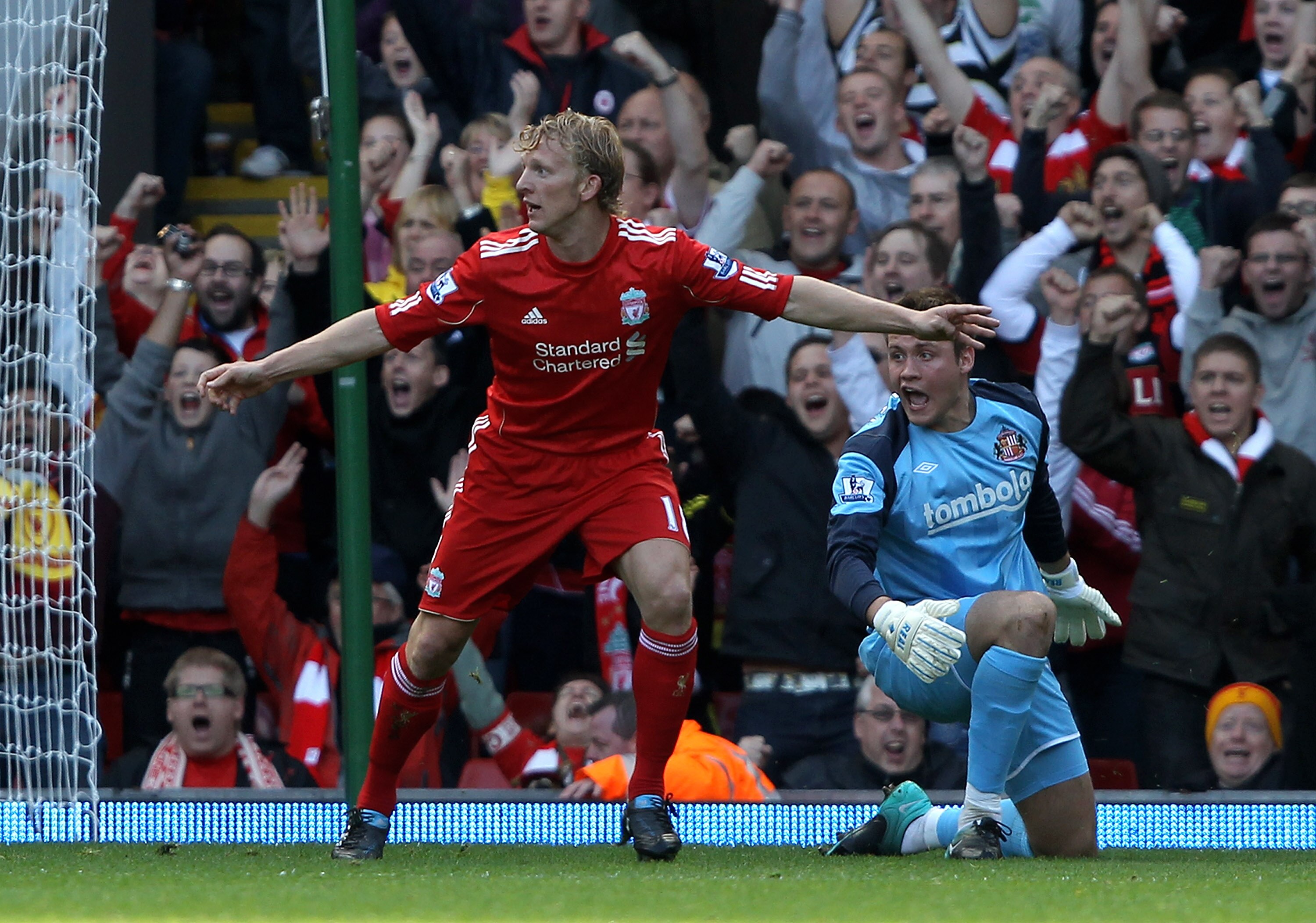 LIVERPOOL, ENGLAND - SEPTEMBER 25: Dirk Kuyt of Liverpool celebrates scoring the first goal during the Barclays Premier League match between Liverpool and Sunderland at at Anfield on September 25, 2010 in Liverpool, England.  (Photo by Clive Brunskill/Get