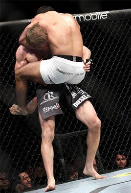 Thiago Tavares chokes out Pat Audinwood at UFC 119 (Courtesy: Yahoo! Sports)