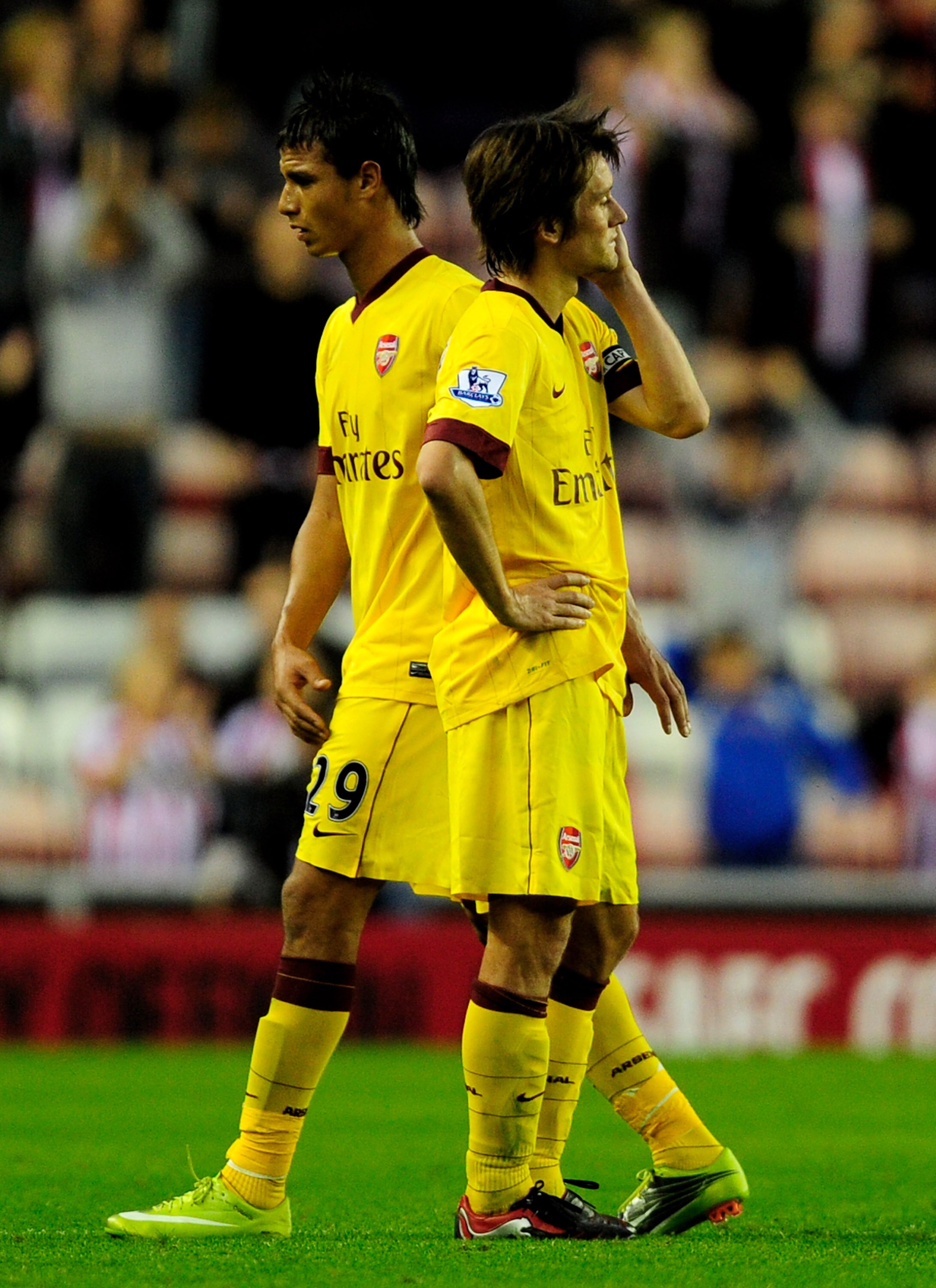 SUNDERLAND, ENGLAND - SEPTEMBER 18:  Marouane Chamakh and Tomas Rosicky (R) of Arsenal look dejected during the Barclays Premier League match between Sunderland and Arsenal at the Stadium of Light on September 18, 2010 in Sunderland, England. (Photo by Ja