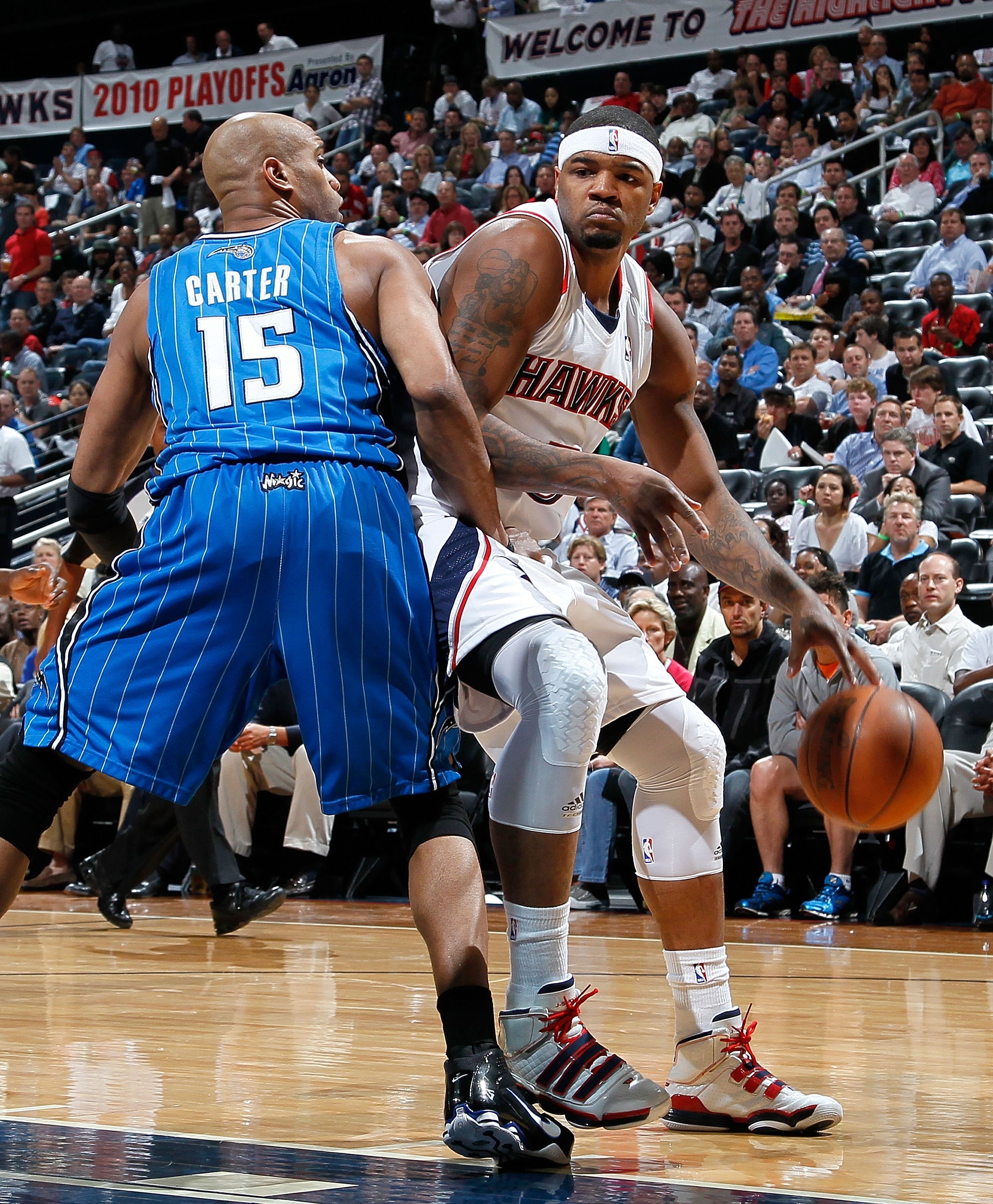 ATLANTA - MAY 10:  Vince Carter #15 of the Orlando Magic against Josh Smith #5 of the Atlanta Hawks during Game Four of the Eastern Conference Semifinals of the 2010 NBA Playoffs at Philips Arena on May 10, 2010 in Atlanta, Georgia.  NOTE TO USER: User ex