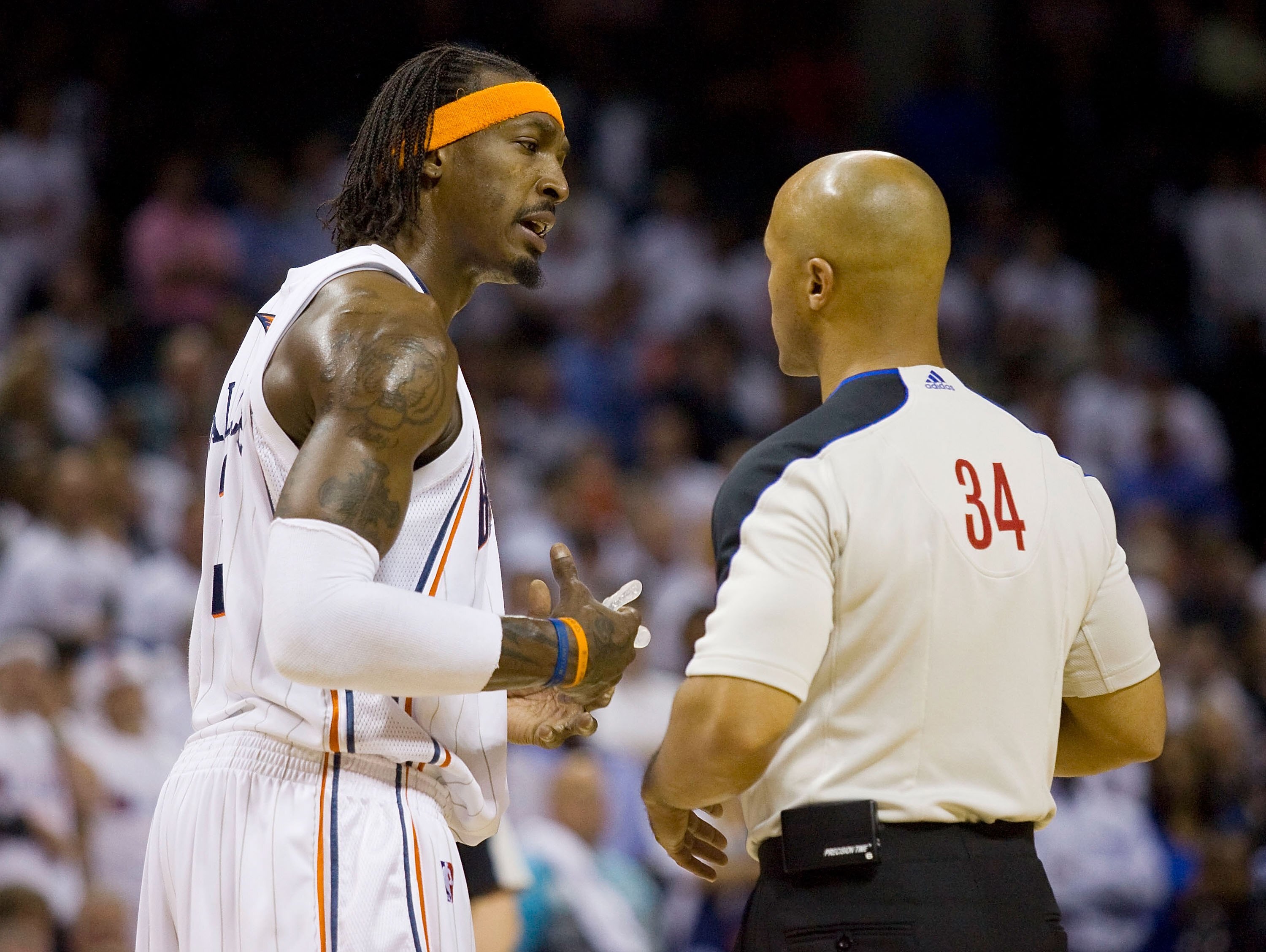 CHARLOTTE, NC - APRIL 26: Gerald Wallace #3 of the Charlotte Bobcats has a discussion with official Marc Davis #34 at Time Warner Cable Arena on April 26, 2010 in Charlotte, North Carolina.  The Magic defeated the Bobcats 99-90 to complete the four game s