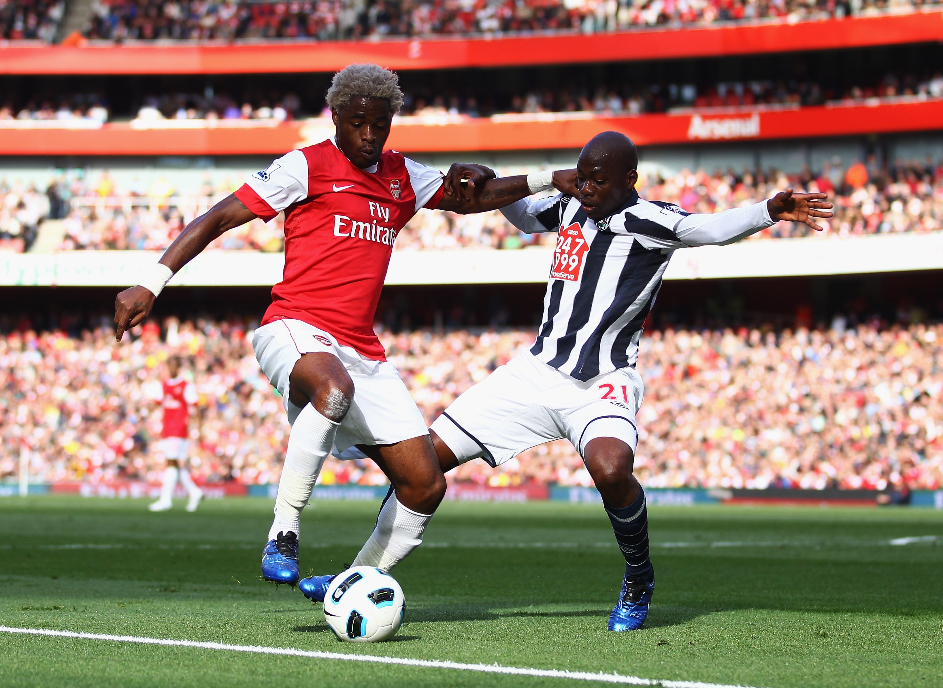 LONDON, ENGLAND - SEPTEMBER 25:  Alex Song of Arsenal battles with Youssuf Mulumbu of West Bromwich Albion during the Barclays Premier League match between Arsenal and West Bromwich Albion at the Emirates Stadium on September 25, 2010 in London, England. 