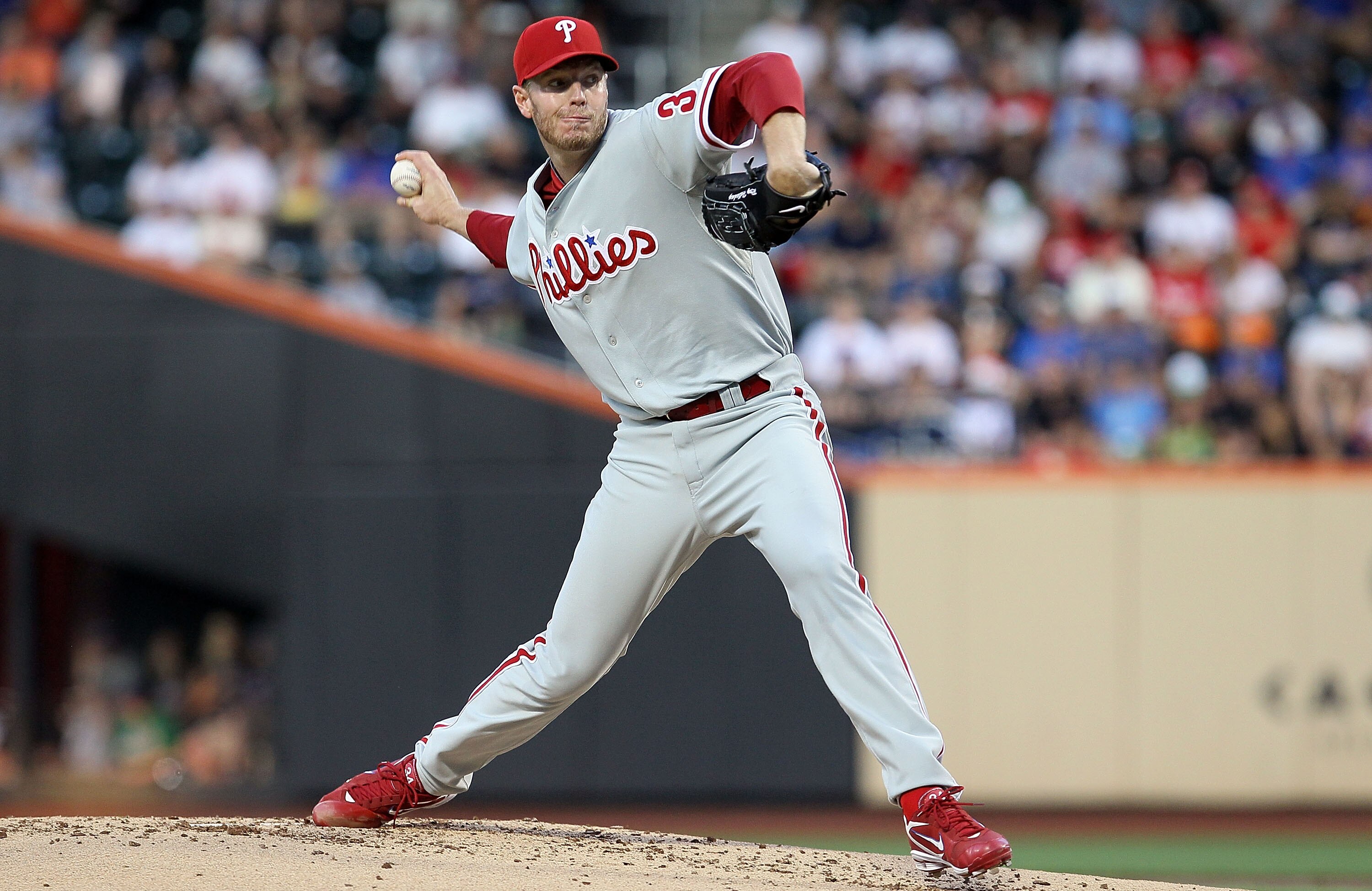 NEW YORK - AUGUST 14:  Roy Halladay #34 of the Philadelphia Phillies delivers a pitch against the New York Mets on August 14, 2010 at Citi Field in the Flushing neighborhood of the Queens borough of New York City.  (Photo by Jim McIsaac/Getty Images)