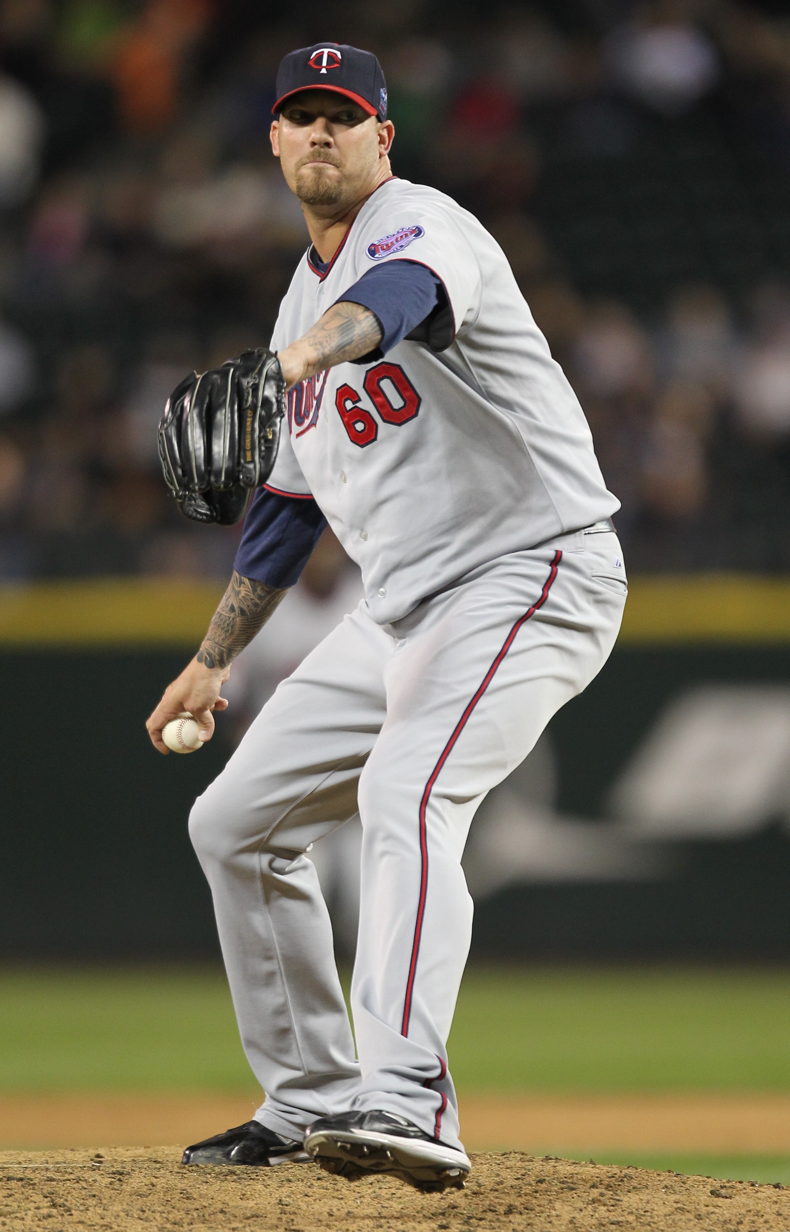 SEATTLE - AUGUST 27:  Relief pitcher Jon Rauch #60 of the Minnesota Twins pitches against the Seattle Mariners at Safeco Field on August 27, 2010 in Seattle, Washington. The Twins won 6-3. (Photo by Otto Greule Jr/Getty Images)