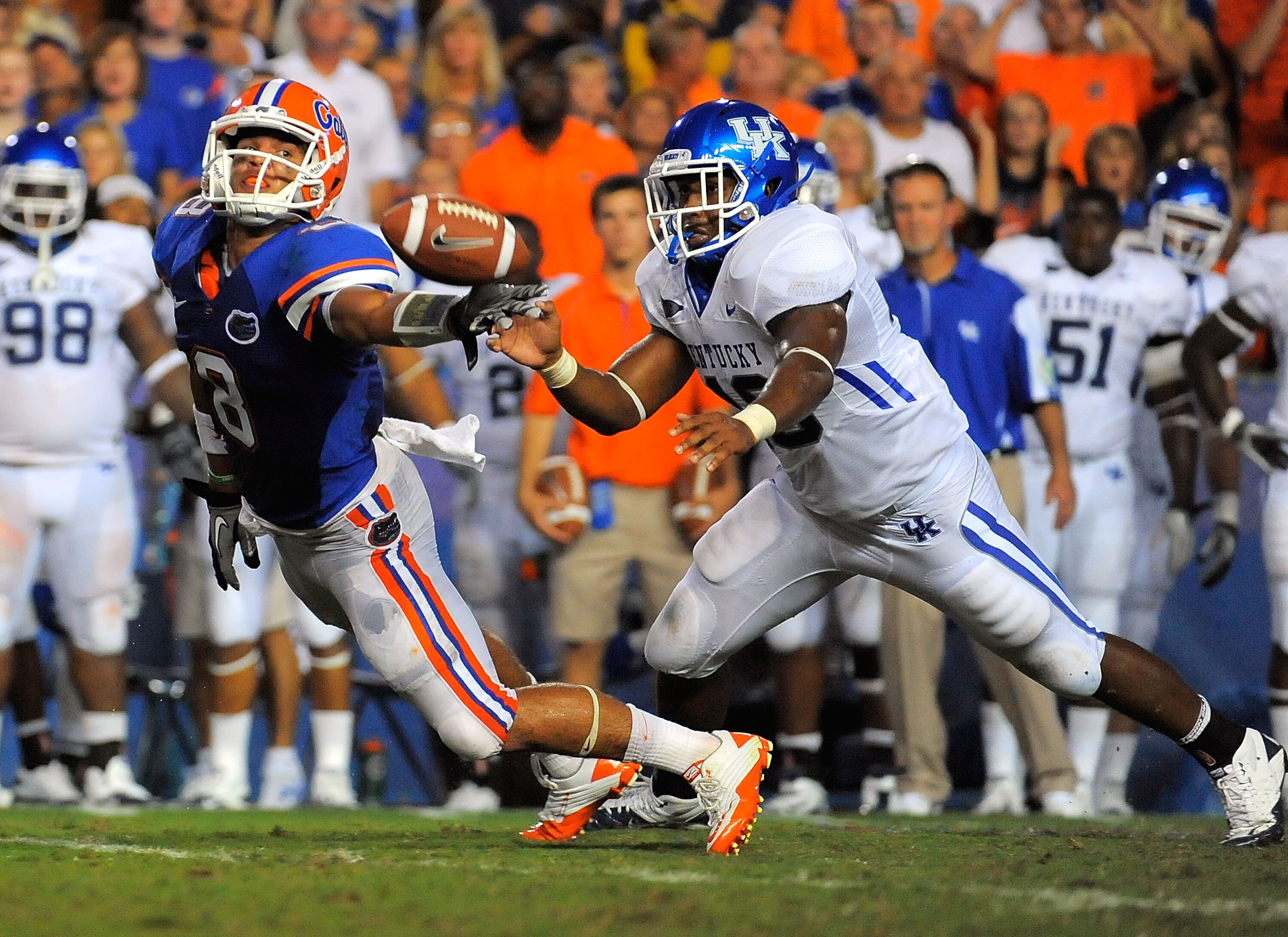 GAINESVILLE, FL - SEPTEMBER 25: Half back Trey Burton #8 of the Florida Gators can't hang onto a pass in front of linebacker Ridge Wilson #48 of the Kentucky Wildcats at Ben Hill Griffin Stadium on September 25, 2010 in Gainesville, Florida. (Photo by D GAINESVILLE, FL - SEPTEMBER 25: Half back Trey Burton #8 of the Florida Gators can't hang onto a pass in front of linebacker Ridge Wilson #48 of the Kentucky Wildcats at Ben Hill Griffin Stadium on September 25, 2010 in Gainesville, Florida. (Photo by D