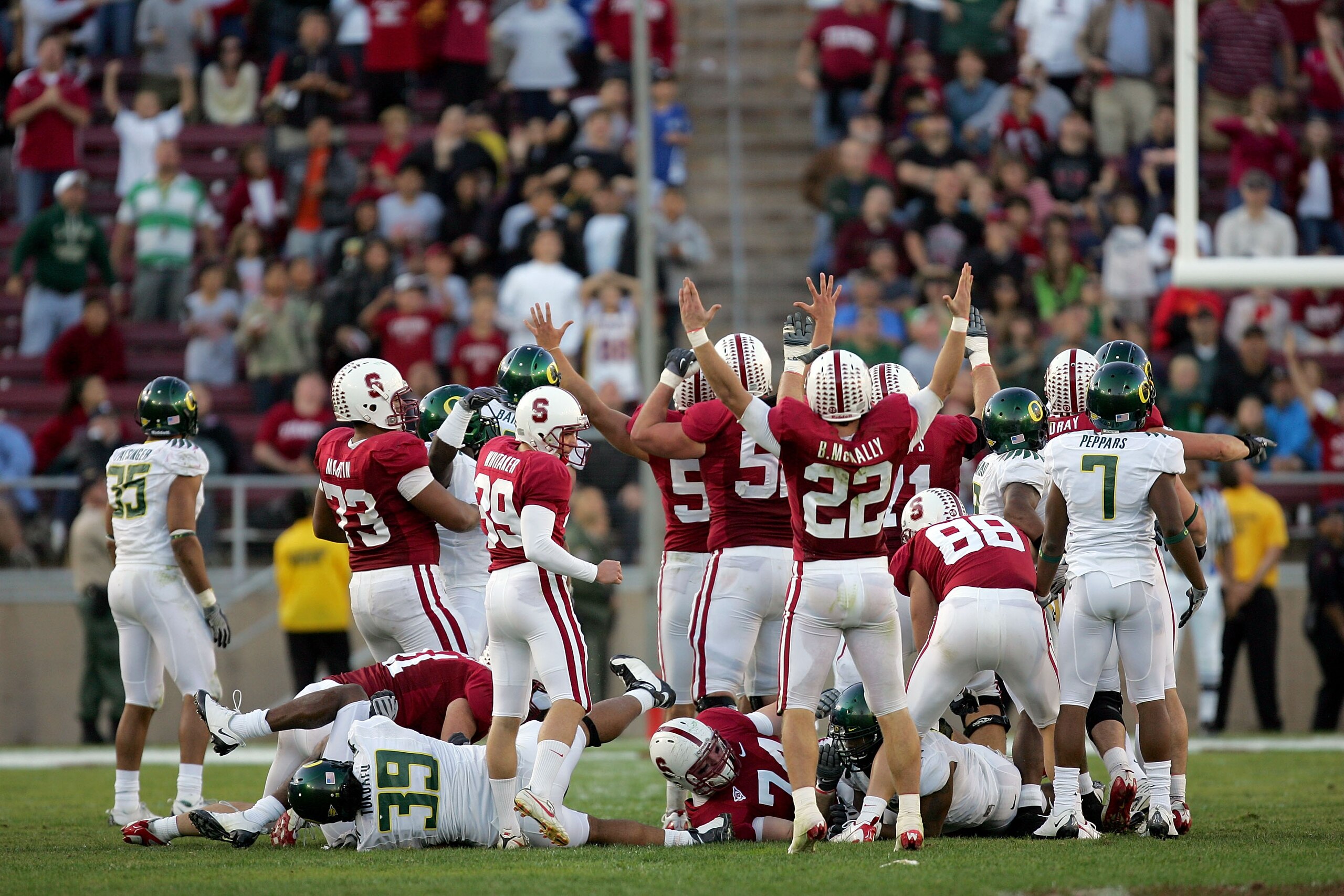 PALO ALTO, CA - NOVEMBER 07:  The Stanford Cardinals celebrate after Nate Whitaker #39 kicked a field goal that clinched their upset win over the Oregon Ducks at Stanford Stadium on November 7, 2009 in Palo Alto, California.  (Photo by Ezra Shaw/Getty Ima