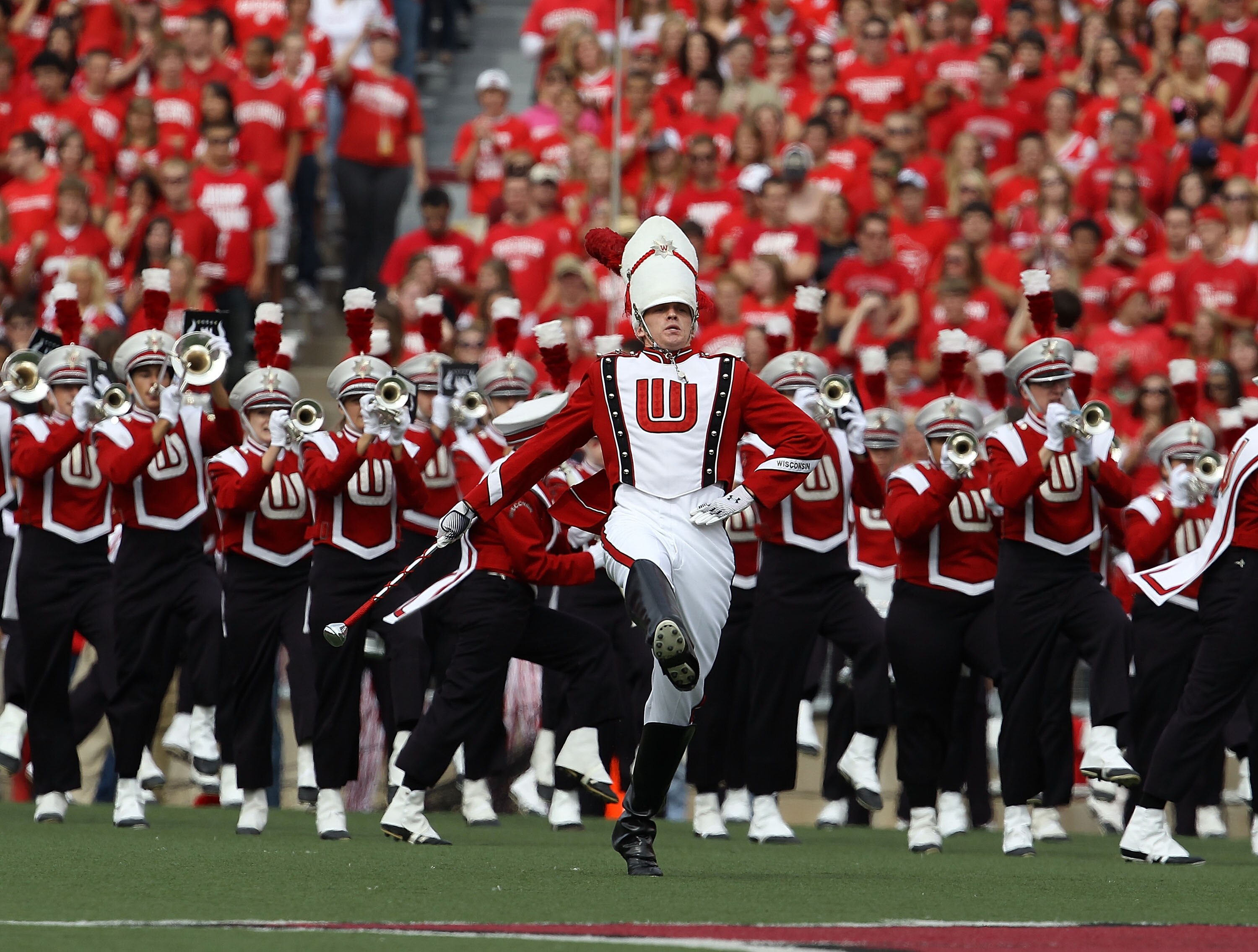 MADISON, WI - SEPTEMBER 18: A drum major leads the Wisconsin Badger band onto the field before a game against the Arizona State Sun Devils at Camp Randall Stadium on September 18, 2010 in Madison, Wisconsin. Wisconsin defeated Arizona State 20-19.  (Photo