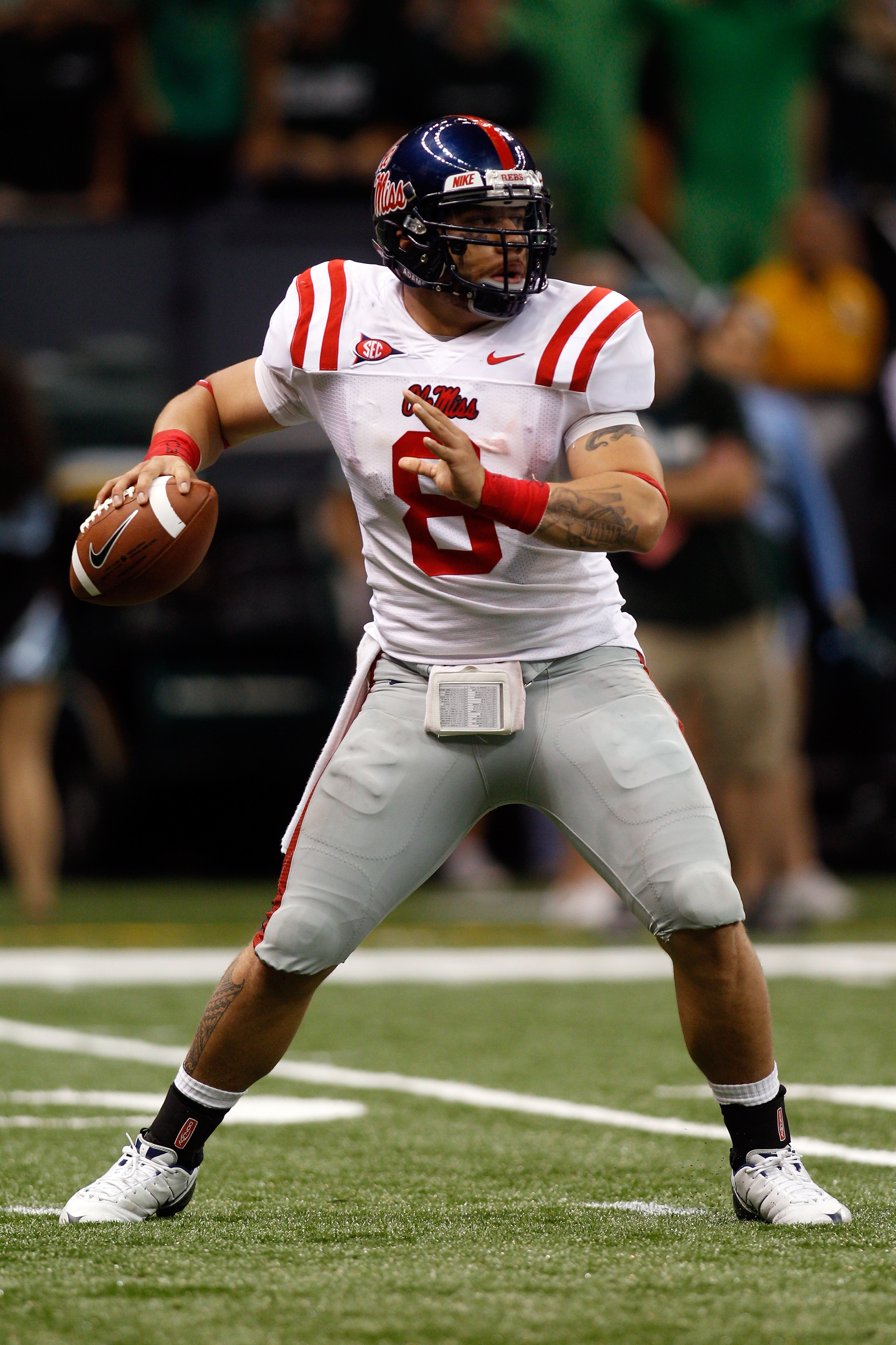 NEW ORLEANS - SEPTEMBER 11:  Jeremiah Masoli #8 of the Ole Miss Rebels in action against the the Tulane Green Wave at the Louisiana Superdome on September 11, 2010 in New Orleans, Louisiana.  Ole Miss defeated Tulane 27-13.  (Photo by Chris Graythen/Getty