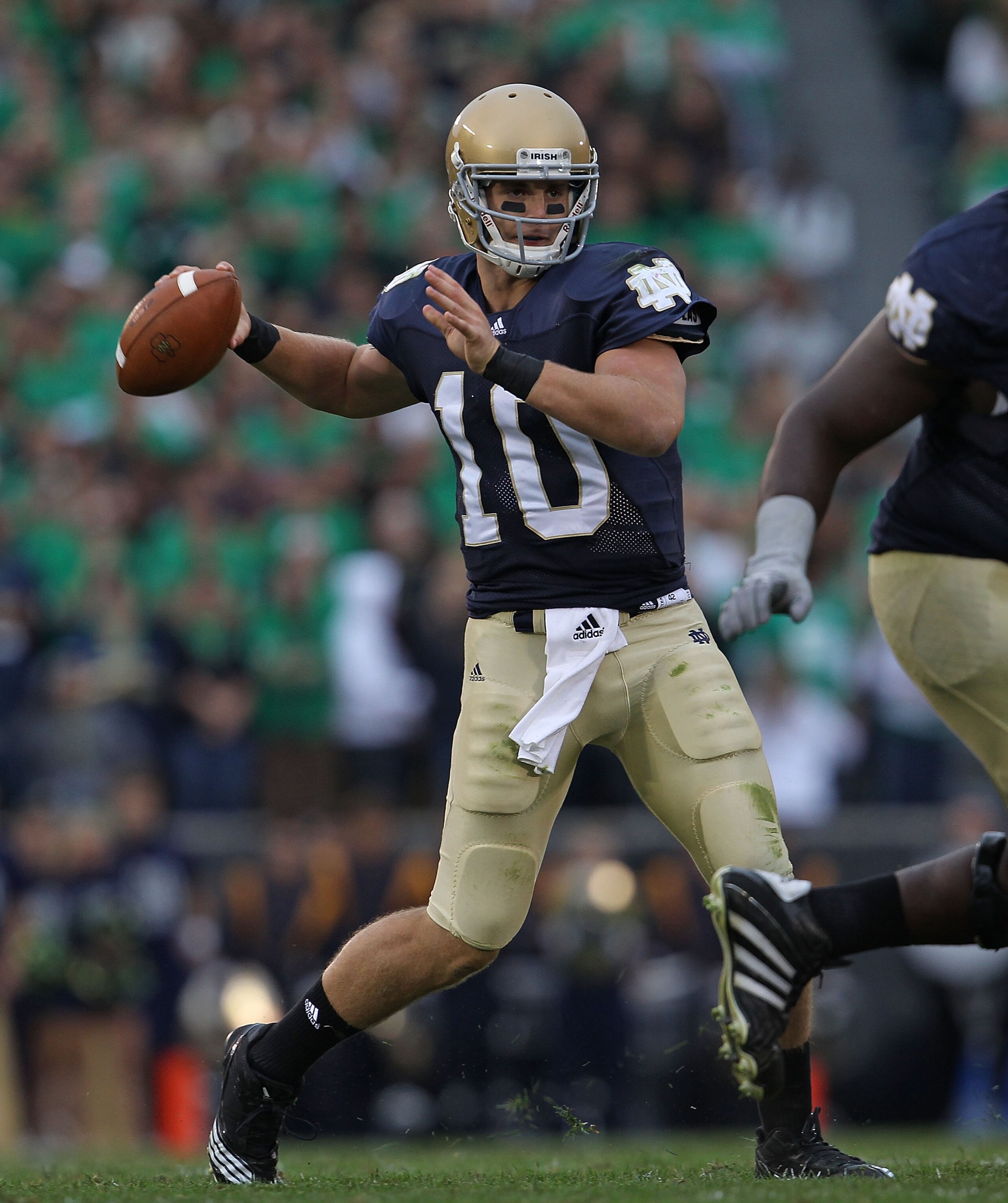 SOUTH BEND, IN - SEPTEMBER 25: Dayne Crist #10 of the Notre Dame Fighting Irish passes the ball against the Stanford Cardinal at Notre Dame Stadium on September 25, 2010 in South Bend, Indiana. Stanford defated Notre Dame 37-14. (Photo by Jonathan Daniel/