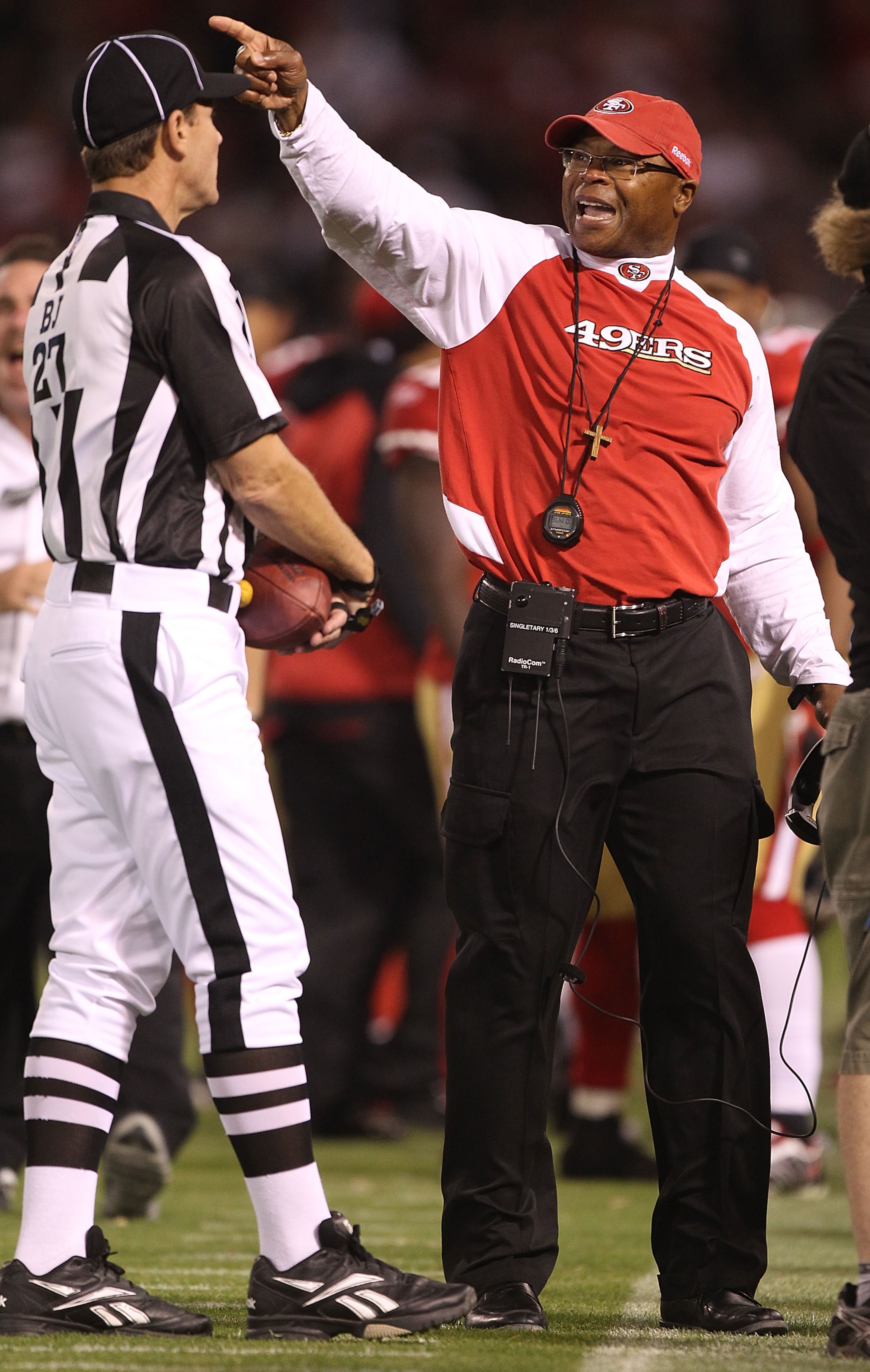 SAN FRANCISCO - SEPTEMBER 20:  Head coach Mike Singletary of the San Francisco 49er talks to a referee against the New Orleans Saints during an NFL game at Candlestick Park on September 20, 2010 in San Francisco, California.(Photo by Jed Jacobsohn/Getty I