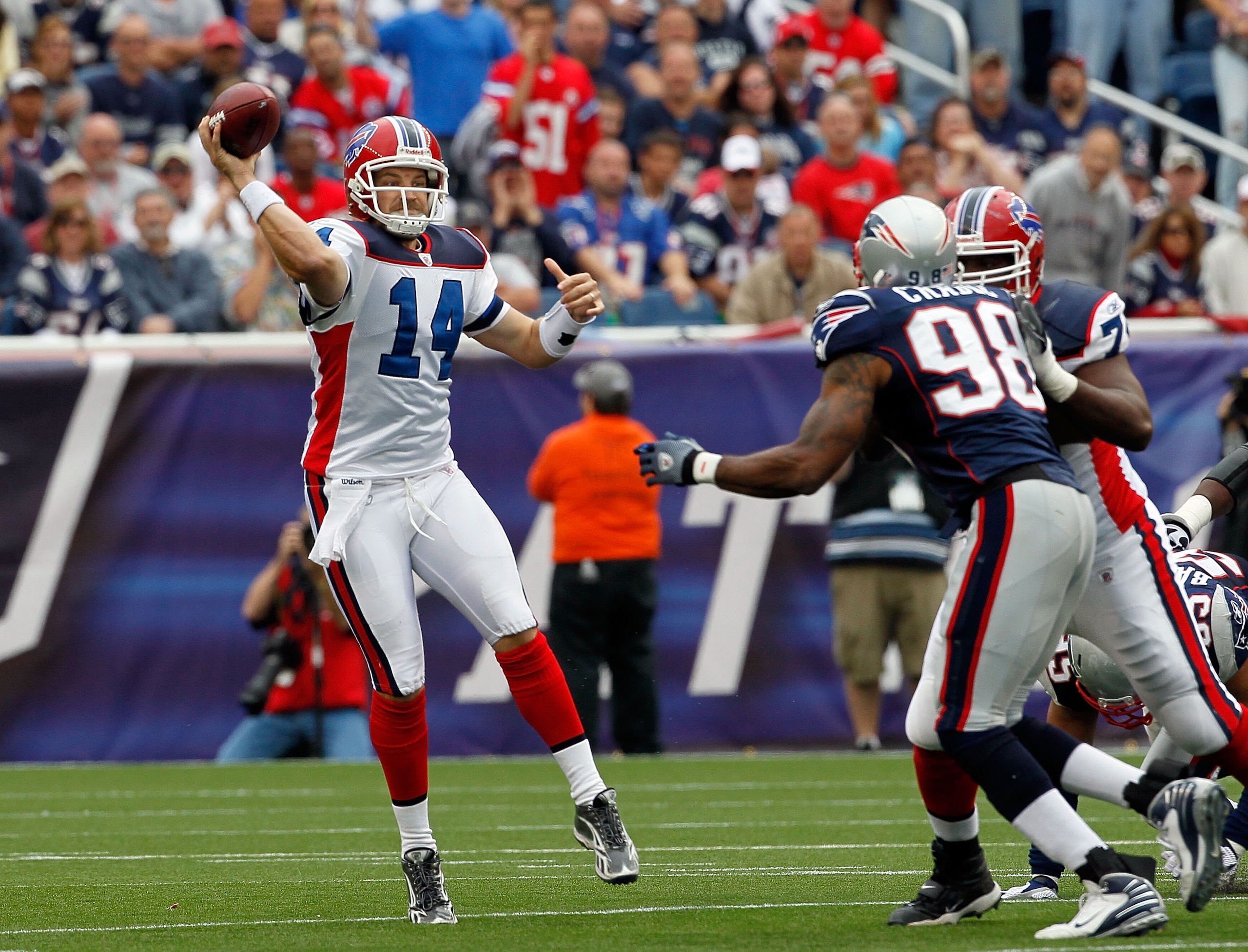 FOXBORO, MA - SEPTEMBER 26:  Quarterback Ryan Fitzpatrick #14 of the Buffalo Bills looks for an open man in the second half against the New England Patriots at Gillette Stadium on September 26, 2010 in Foxboro, Massachusetts. (Photo by Jim Rogash/Getty Im